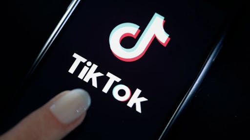 B0D63477-E16F-43FA-95FB-3E9A93CA3C11_1_201_a Tik Tok media App Illustration PARIS, FRANCE - MARCH 05: In this photo illustration, the social media application logo, Tik Tok is displayed on the screen of an iPhone on March 05, 2019 in Paris, France. The social network broke the rules for the protection of children's online privacy (COPPA) and was fined $ 5.7 million. The fact TikTok criticized is quite serious in the United States, the platform, which currently has more than 500 million users worldwide, collected data that should not have asked minors. TikTok, also known as Douyin in China, is a media app for creating and sharing short videos. Owned by ByteDance, Tik Tok is a leading video platform in Asia, United States, and other parts of the world. In 2018, the application gained popularity and became the most downloaded app in the U.S. in October 2018. (Photo by Chesnot/Getty Images) Chesnot / Contributor