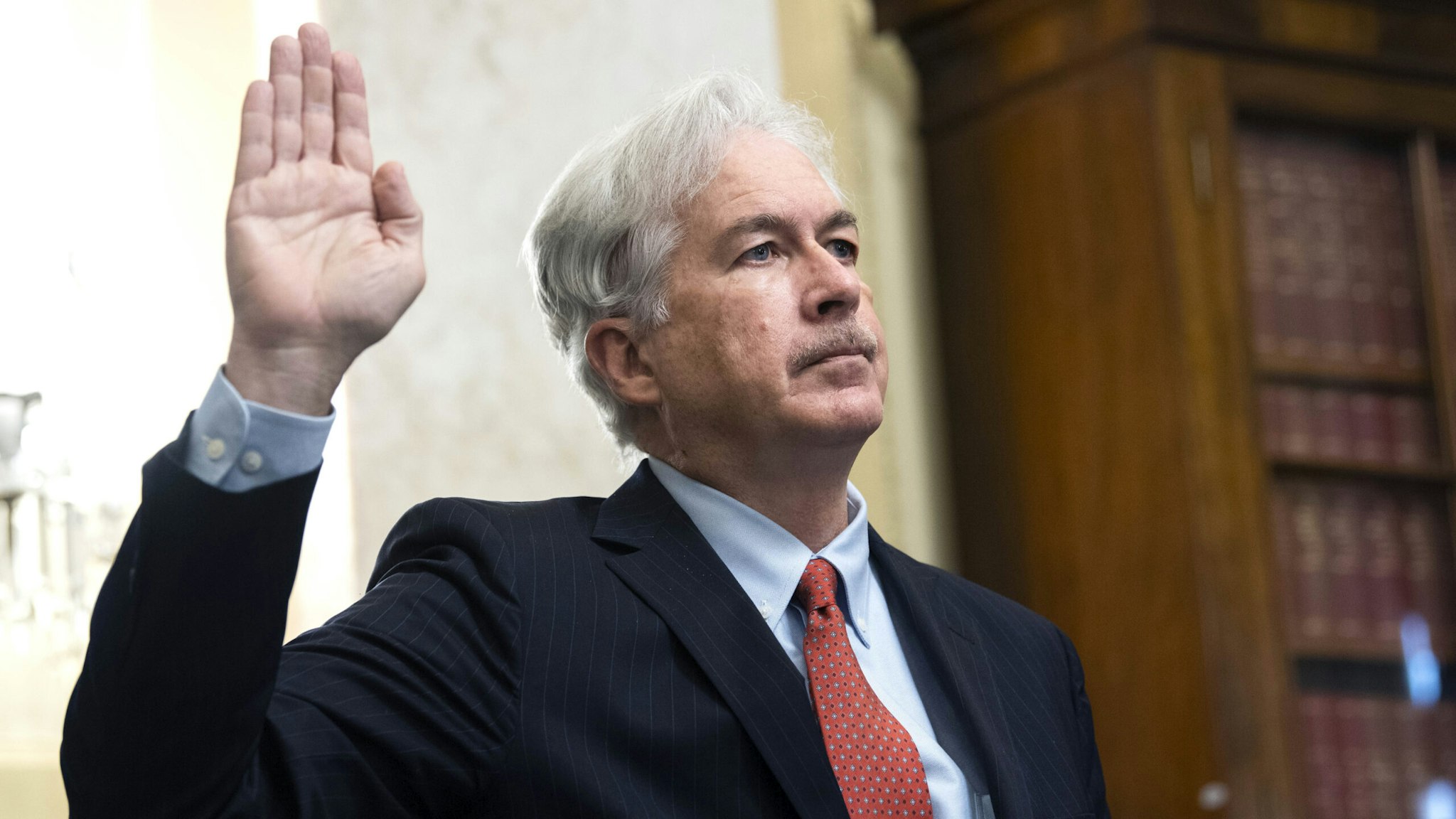 UNITED STATES - FEBRUARY 24: William Burns, nominee for Central Intelligence Agency director, is sworn into his Senate Select Intelligence Committee confirmation hearing in Russell Senate Office Building on Capitol Hill in Washington, D.C., on Wednesday, February 24, 2021.