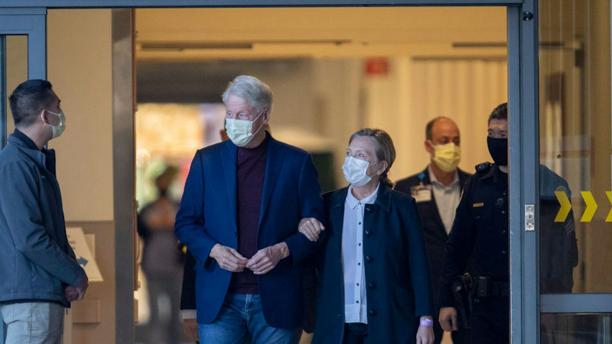 Orange, CA - October 17: Former President Bill Clinton exits the hospital with former First Lady and former U.S. Secretary of State Hillary Clinton after being discharged from the University of California-Irvine Medical Center in Orange where he spent six days fighting an infection Sunday, Oct. 17, 2021.