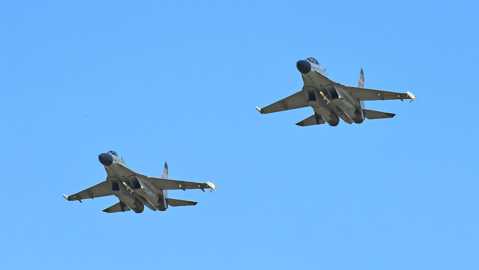 Chinese fighter jets escort an aircraft carrying the remains of Chinese People's Volunteers CPV martyrs in Shenyang, northeast China's Liaoning Province, Sept. 2, 2021. The remains of 109 CPV martyrs killed in the 1950-53 Korean War and 1,226 related relics were returned to China on Thursday from South Korea in the eighth repatriation of its kind since 2014.