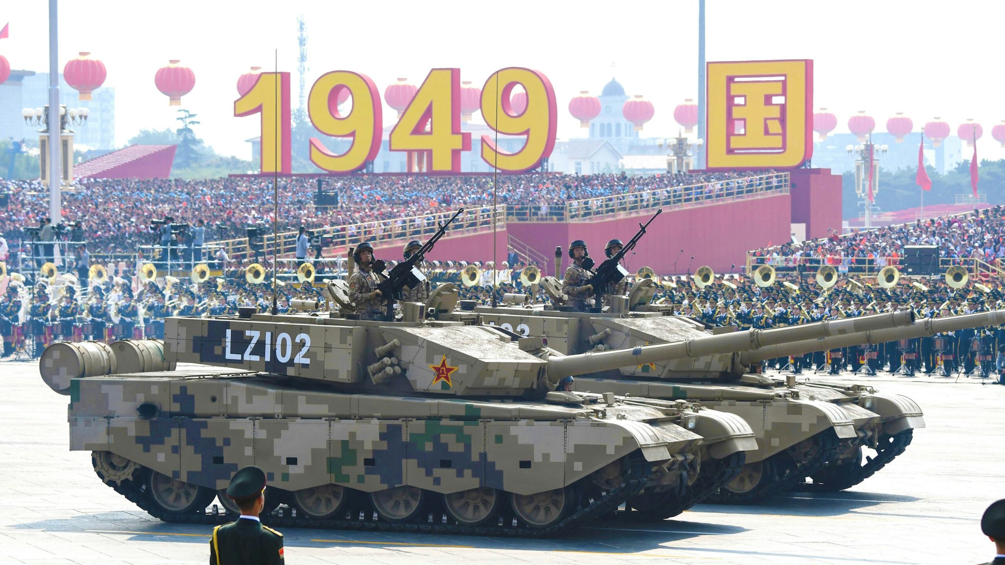 Military vehicles take part in a military parade at Tiananmen Square in Beijing on October 1, 2019, to mark the 70th anniversary of the founding of the Peoples Republic of China.