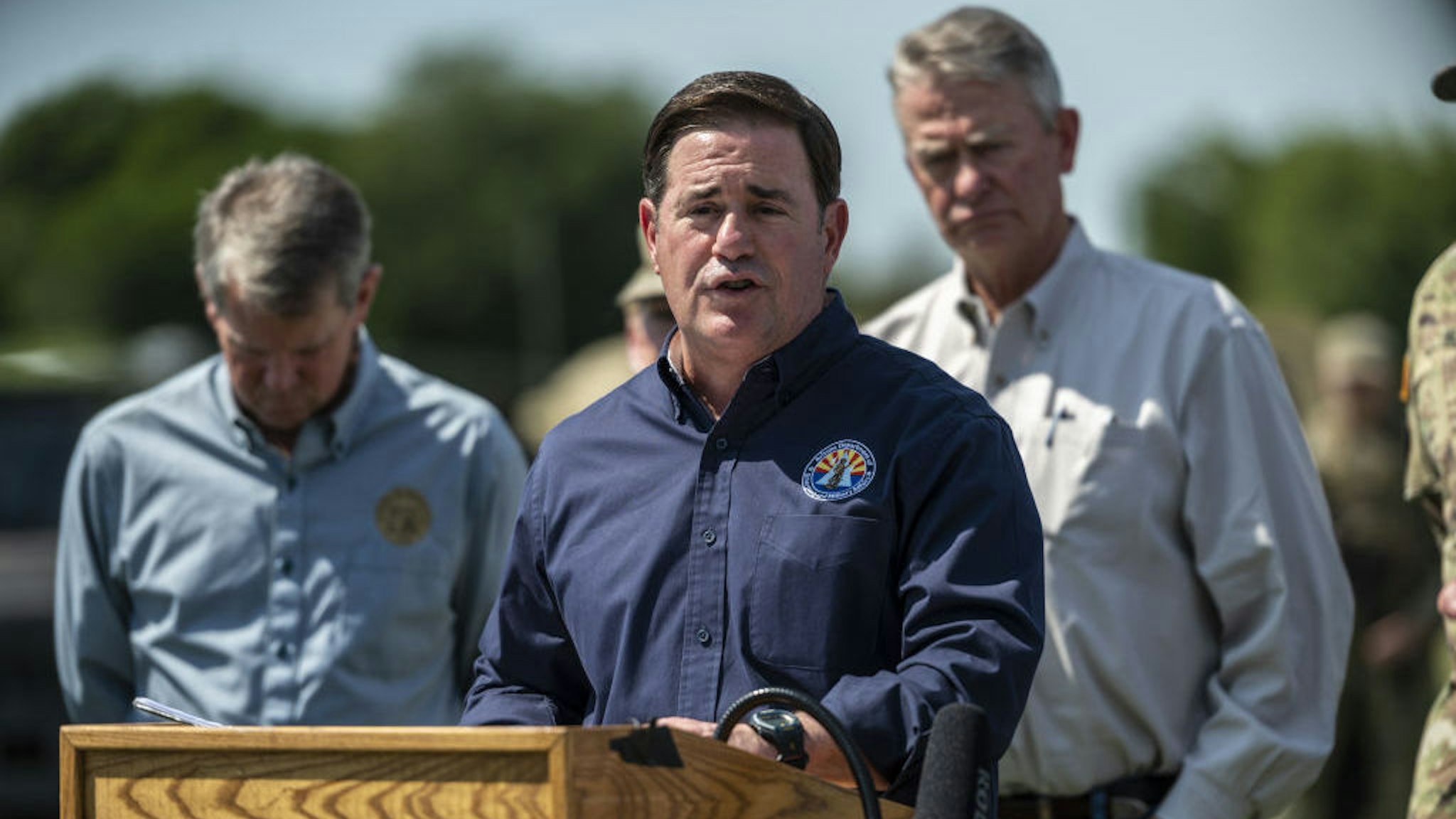 Doug Ducey, governor of Arizona, speaks during a news conference in Mission, Texas, U.S., on Wednesday, Oct. 6, 2021. Texas Governor Abbott and Republican state chief executives from around the nation gathered at the border to again call attention to unauthorized immigration across the Rio Grande. Photographer: Sergio Flores/Bloomberg