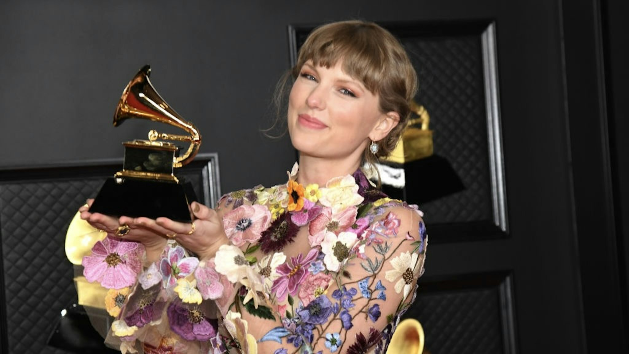 63rd Annual GRAMMY Awards – Media Room LOS ANGELES, CALIFORNIA - MARCH 14: Taylor Swift, winner of Album of the Year for 'Folklore', poses in the media room during the 63rd Annual GRAMMY Awards at Los Angeles Convention Center on March 14, 2021 in Los Angeles, California. (Photo by Kevin Mazur/Getty Images for The Recording Academy ) Kevin Mazur / Contributor