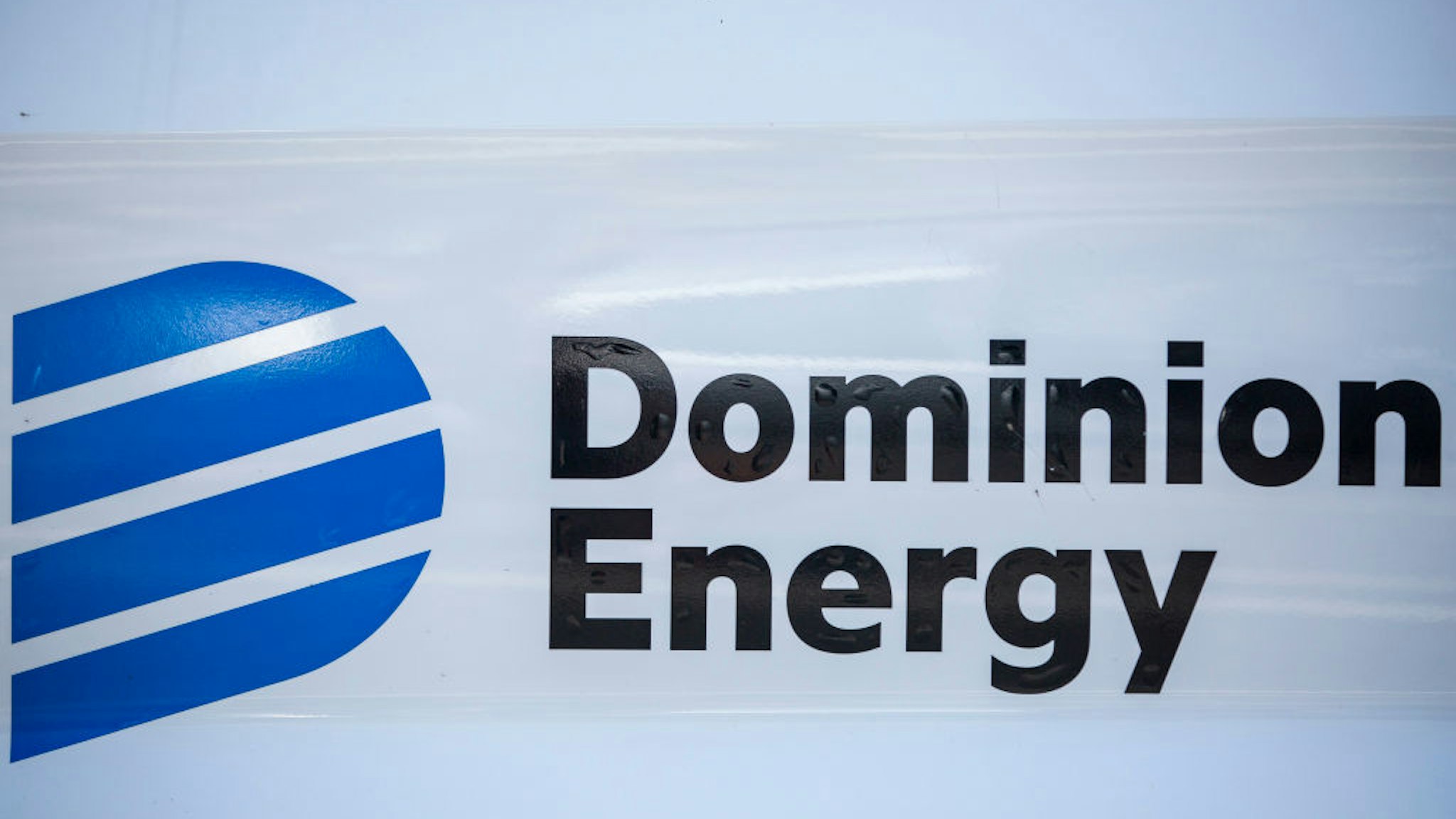 A logo on a Domionion Energy company car is pictured on July 6, 2020 in Richmond, Virginia.