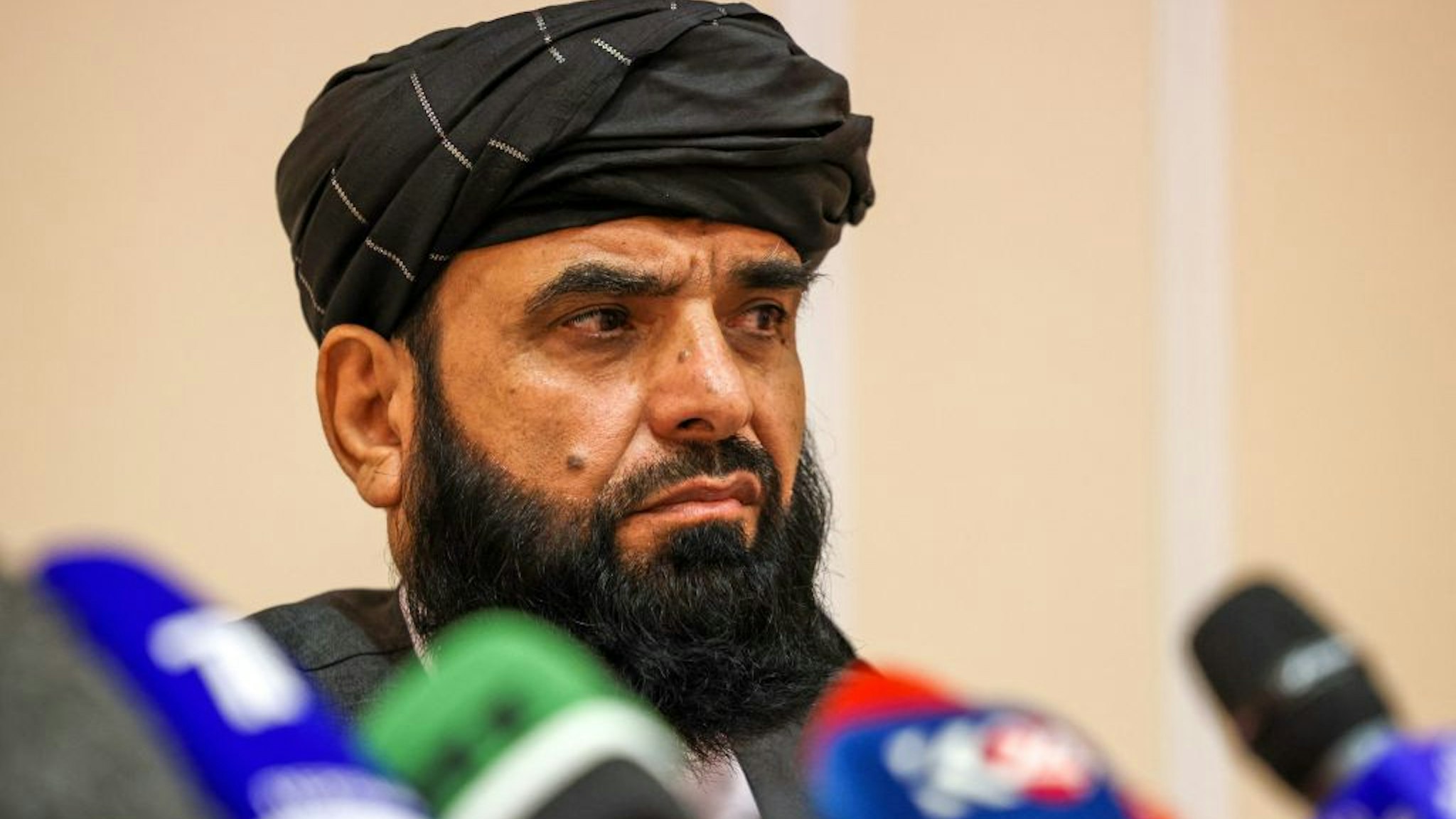 Taliban negotiator Suhail Shaheen attends a press conference in Moscow on July 9, 2021. - Russia on July 9, 2021 said the Taliban controls about two-thirds of the Afghan-Tajik border and urged all sides in Afghanistan to show restraint.