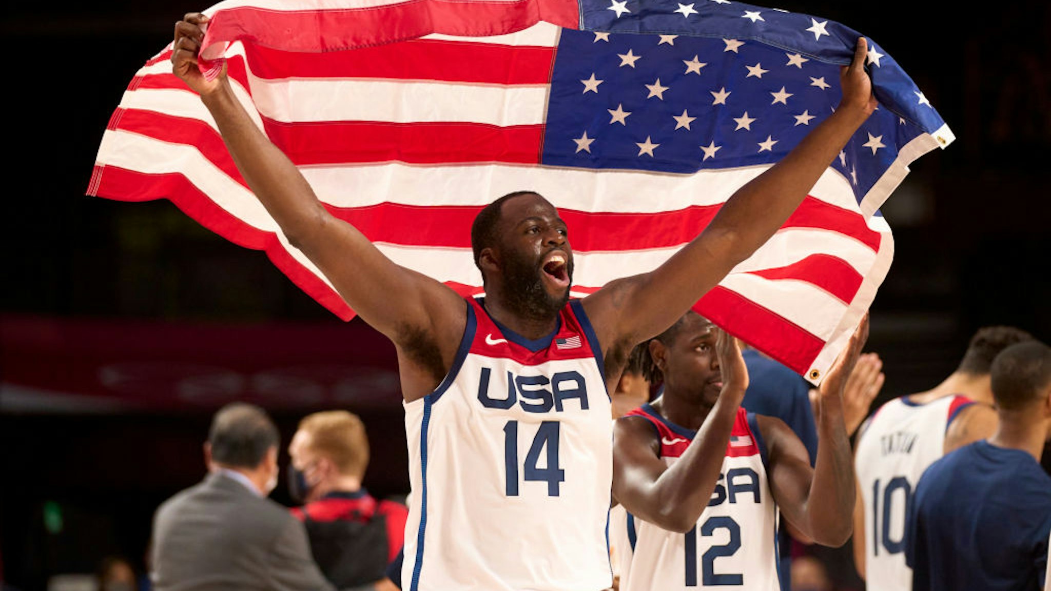 Basketball: 2020 Summer Olympics: USA Draymond Green (14) victorious holding up USA flag after Men's Final vs France at Saitama Super Arena. USA wins gold. Tokyo, Japan 8/7/2021 CREDIT: Erick W. Rasco/Sports Illustrated via Getty Images) (Set Number: X163748 TK1)
