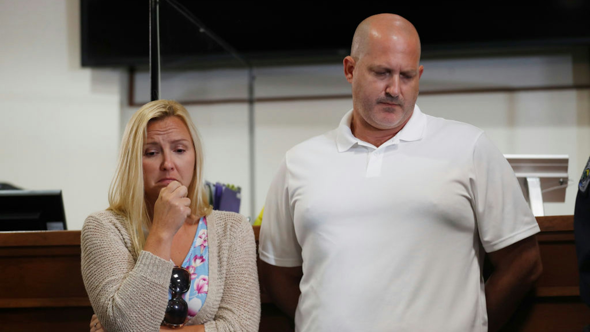 Tara Petito (L) and Joe Petito react while the City of North Port Chief of Police Todd Garrison speaks during a news conference for their missing daughter Gabby Petito on September 16, 2021 in North Port, Florida.