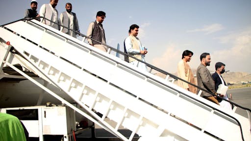AFGHANISTAN-KABUL-INT’L COMMERCIAL FLIGHT-AIRPORT Passengers disembark from a plane at Kabul International Airport in Kabul, capital of Afghanistan, Sept. 20, 2021.