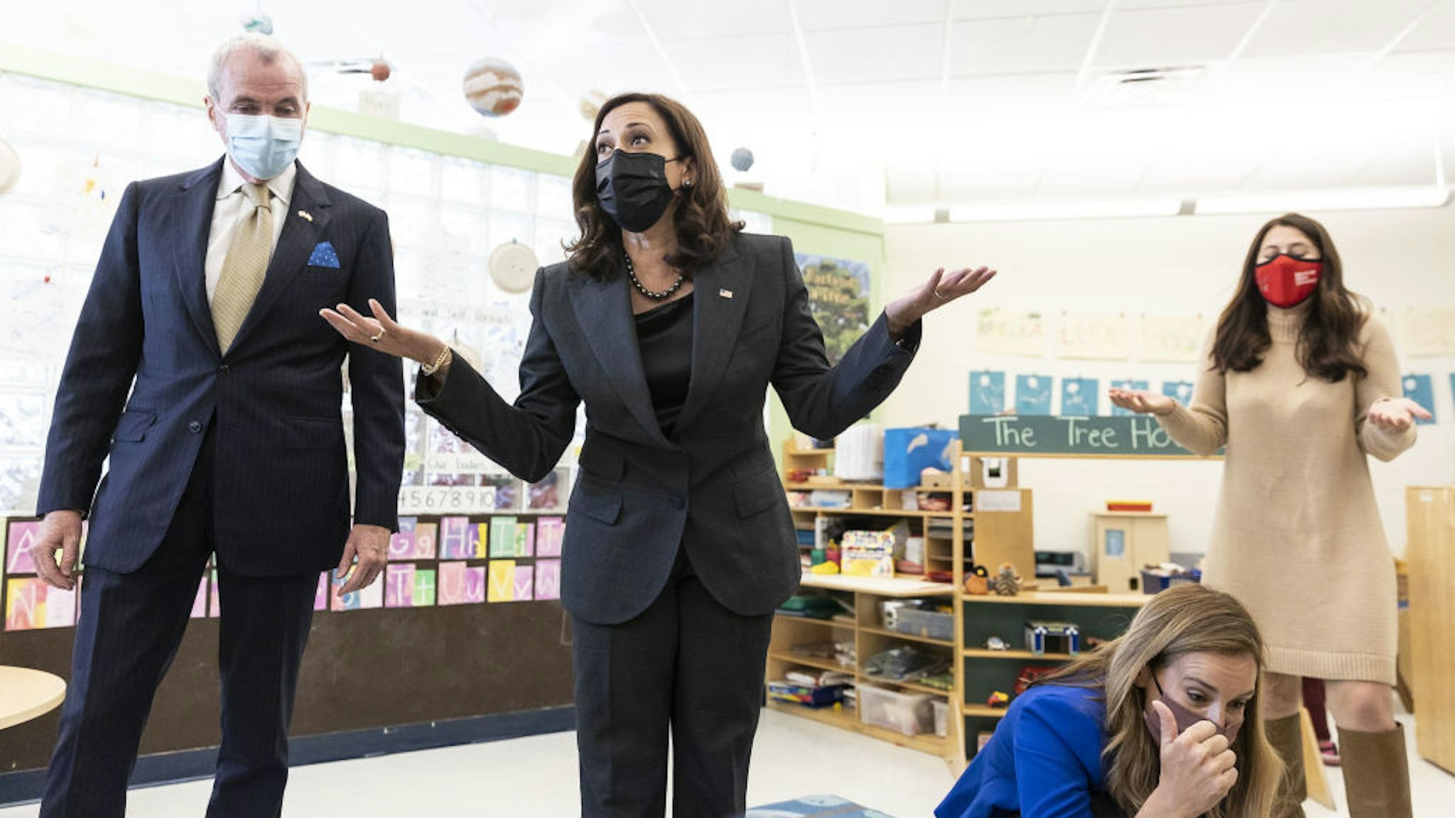 Phil Murphy, New Jersey's governor, left, and U.S. Vice President Kamala Harris speak with children at Ben Samuels Childrens Center at Montclair State University in Little Falls, New Jersey, U.S., on Friday, Oct. 8, 2021.