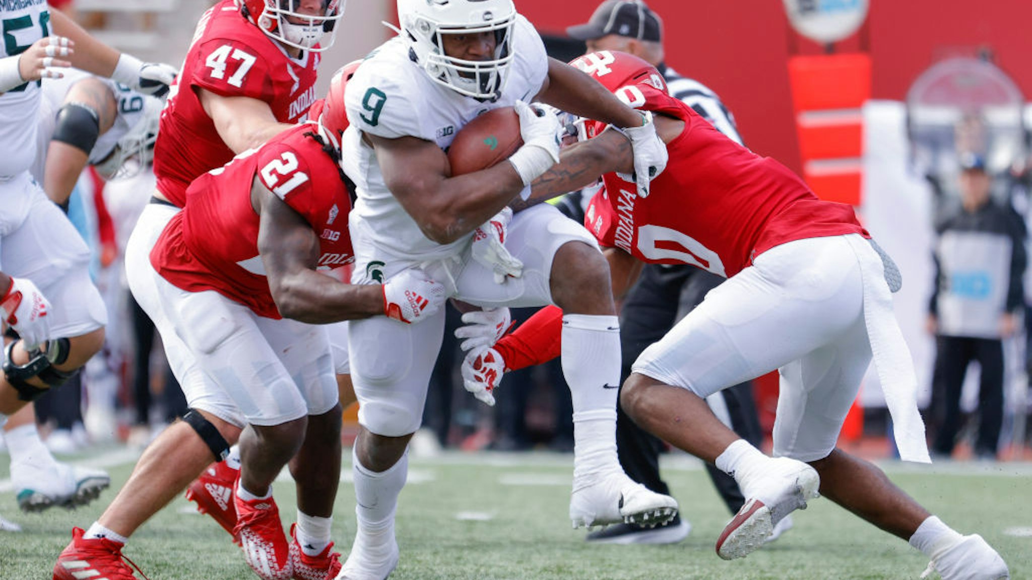 BLOOMINGTON, IN - OCTOBER 16: Kenneth Walker III #9 of the Michigan State Spartans runs the ball during the game against the Indiana Hoosiers at Indiana University on October 16, 2021 in Bloomington, Indiana. (Photo by Michael Hickey/Getty Images)