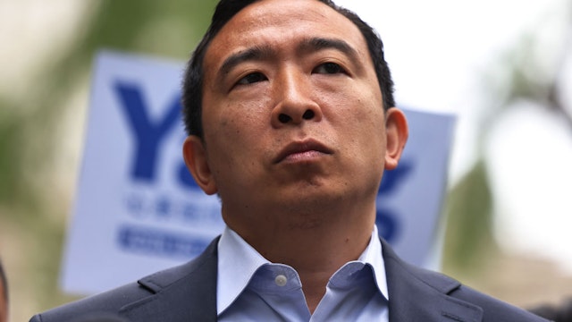 NEW YORK, NEW YORK - MAY 24: New York City Mayoral candidate Andrew Yang stands silently as he takes questions from reporters during a rally at City Hall Park in Manhattan on May 24, 2021 in New York City. NYC Mayoral candidate Andrew Yang held a rally today where he received the endorsement of State Senator John C. Liu. (Photo by Michael M. Santiago/Getty Images)
