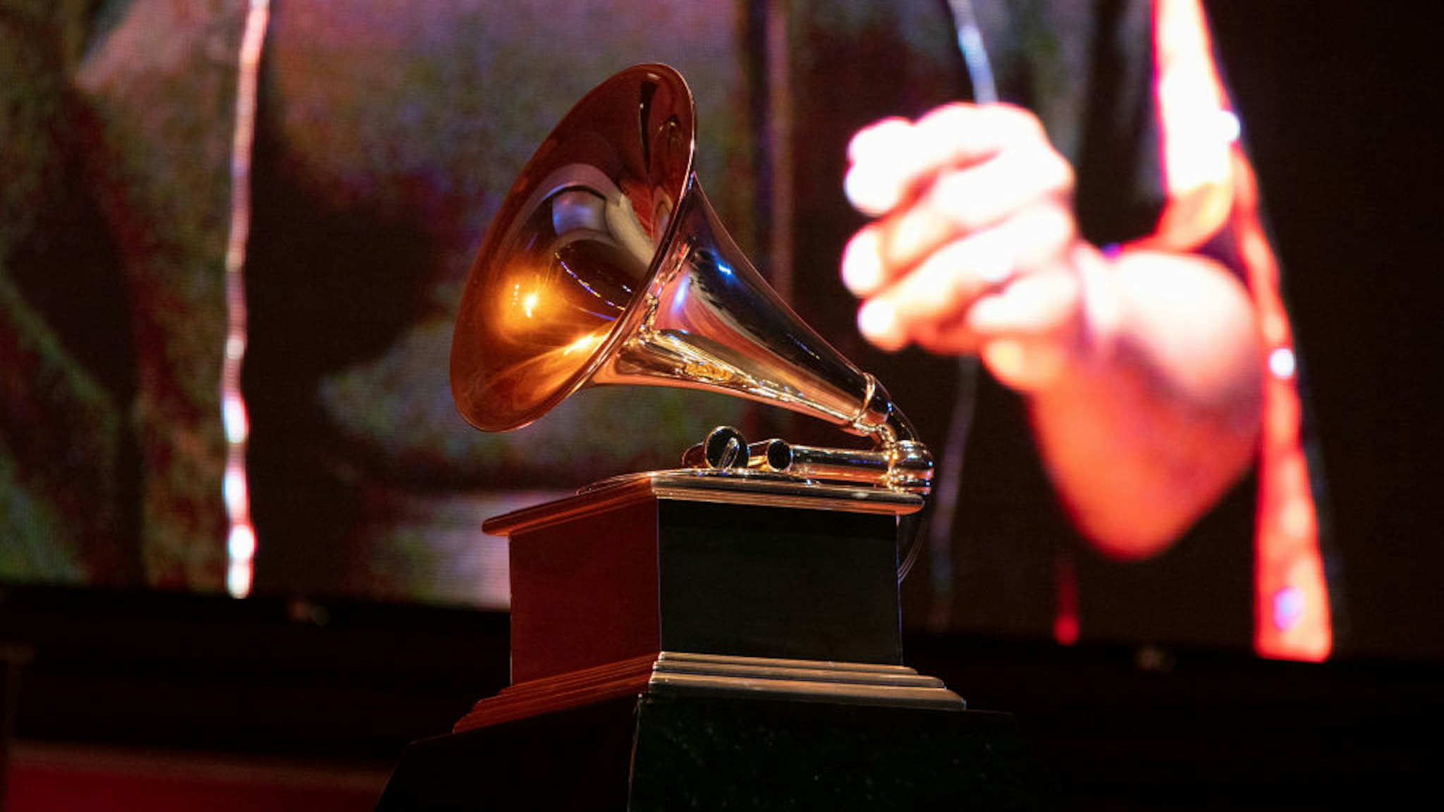 CHICAGO, ILLINOIS - SEPTEMBER 16: A view of a Grammy statue during a performance at the Chicago Chapter 60th Anniversary Concert at Millennium Park on September 16, 2021 in Chicago, Illinois. (Photo by Jeff Schear/Getty Images for The Recording Academy)
