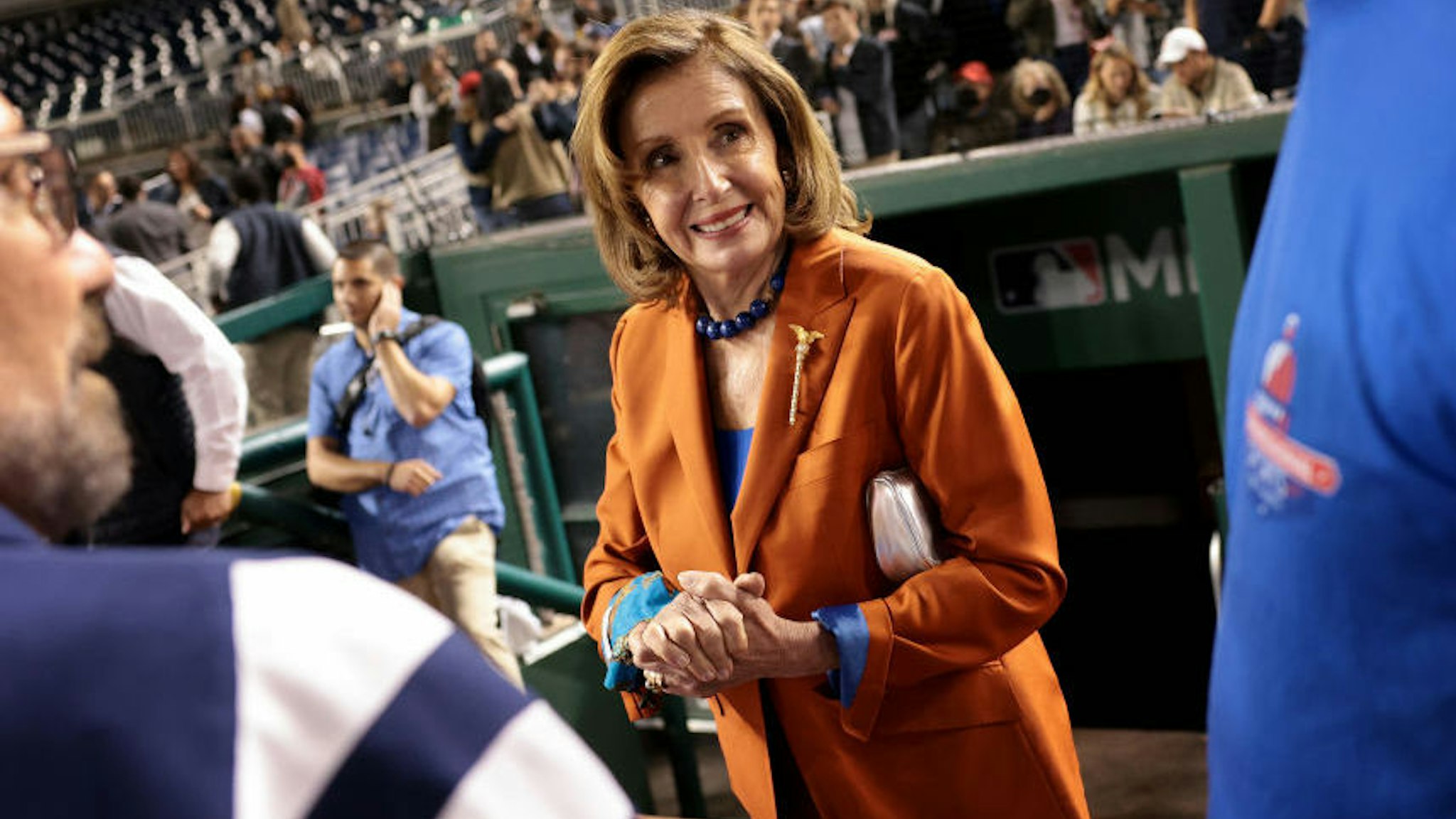House Speaker Nancy Pelosi (D-CA) congratulates members of the Democratic team following the Congressional baseball game at Nationals Park September 29, 2021 in Washington, DC.
