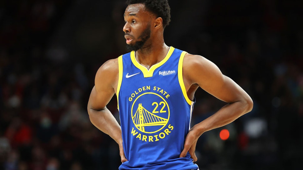PORTLAND, OREGON - OCTOBER 04: Andrew Wiggins #22 of the Golden State Warriors reacts against the Portland Trail Blazers in the first quarter during the preseason game at Moda Center on October 04, 2021 in Portland, Oregon. NOTE TO USER: User expressly acknowledges and agrees that, by downloading and or using this photograph, User is consenting to the terms and conditions of the Getty Images License Agreement. (Photo by Abbie Parr/Getty Images)