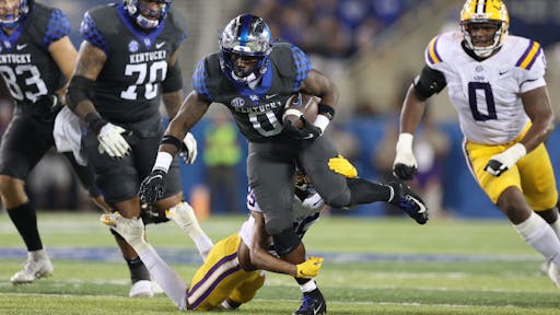 LSU v Kentucky LEXINGTON, KENTUCKY - OCTOBER 09: Kavosiey Smoke #0 of the Kentucky Wildcats runs with the ball against the LSU Tigers at Kroger Field on October 09, 2021 in Lexington, Kentucky. (Photo by Andy Lyons/Getty Images)