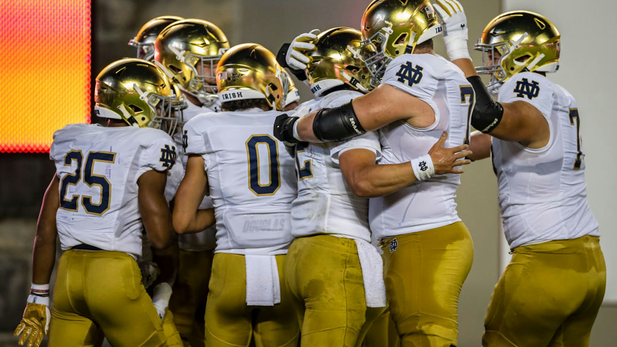 BLACKSBURG, VA - OCTOBER 09: Notre Dame Fighting Irish players celebrate after a touchdown against the Virginia Tech Hokies during the first half of the game at Lane Stadium on October 9, 2021 in Blacksburg, Virginia. (Photo by Scott Taetsch/Getty Images)