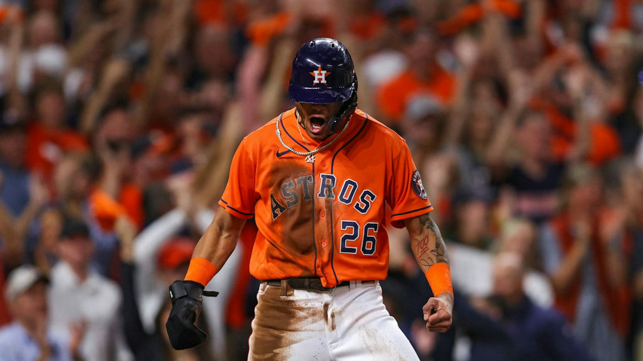 HOUSTON, TEXAS - OCTOBER 27: Jose Siri #26 of the Houston Astros celebrates after scoring a run against the Atlanta Braves during the second inning in Game Two of the World Series at Minute Maid Park on October 27, 2021 in Houston, Texas. (Photo by Patrick Smith/Getty Images)