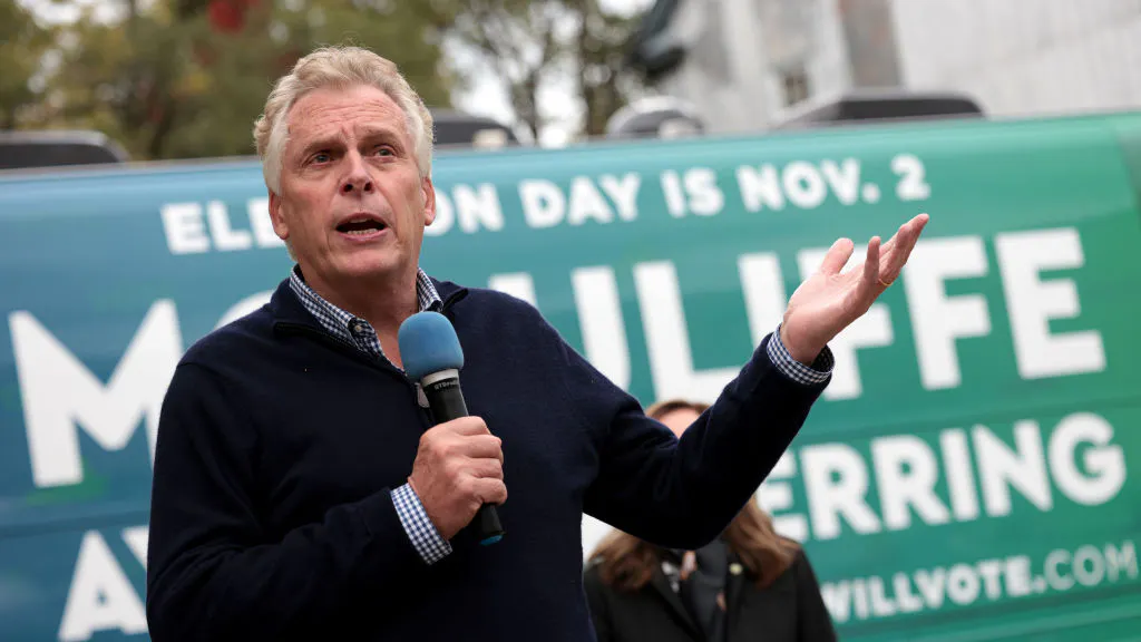 McAuliffe’s Grown Daughter Poses In Front Of Youngkin Sign, Flips The Bird