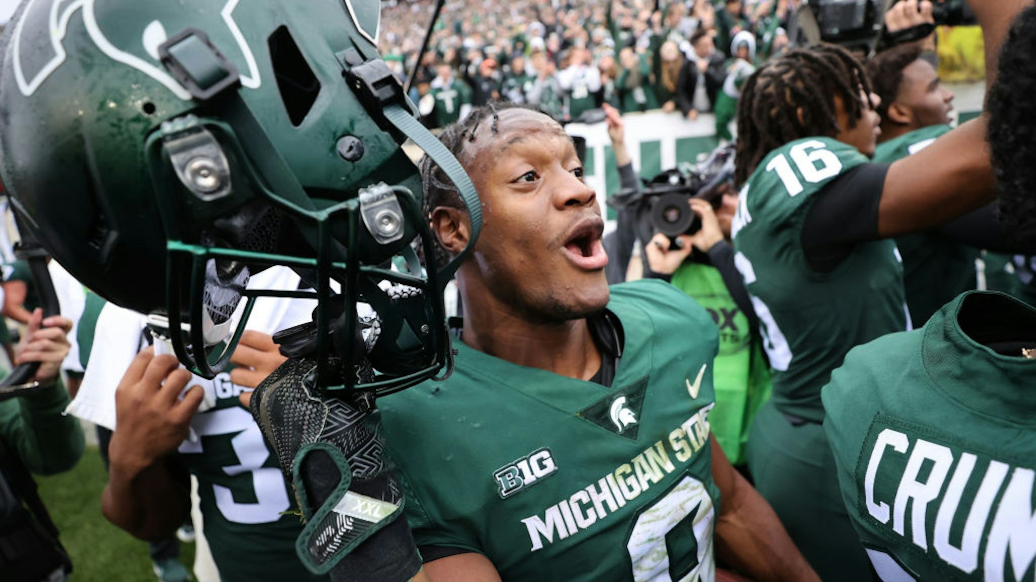 EAST LANSING, MICHIGAN - OCTOBER 30: Kenneth Walker III #9 of the Michigan State Spartans celebrates a 37-33 win over the Michigan Wolverines at Spartan Stadium on October 30, 2021 in East Lansing, Michigan. (Photo by Gregory Shamus/Getty Images)