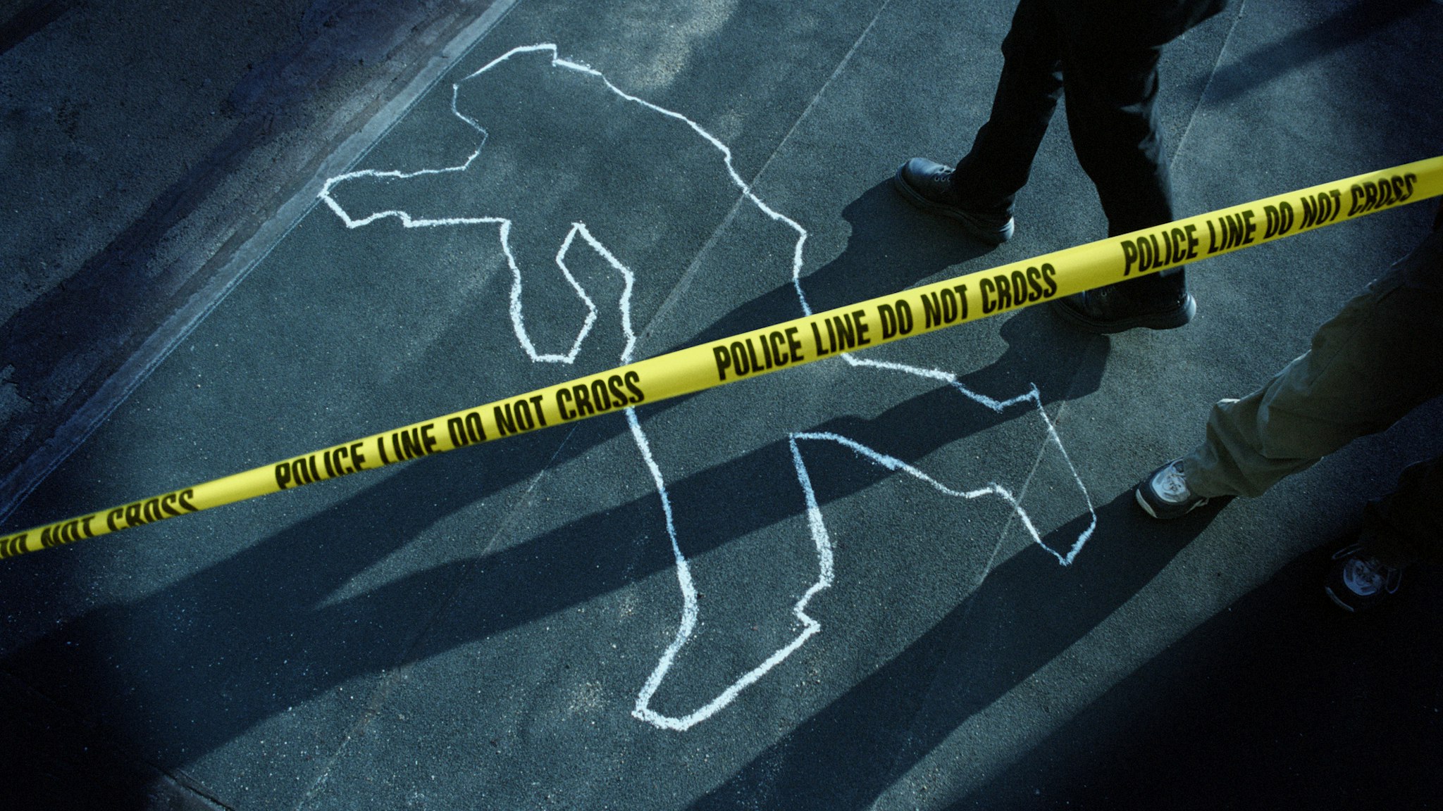 Chalk Outline at Police Crime Scene - stock photo