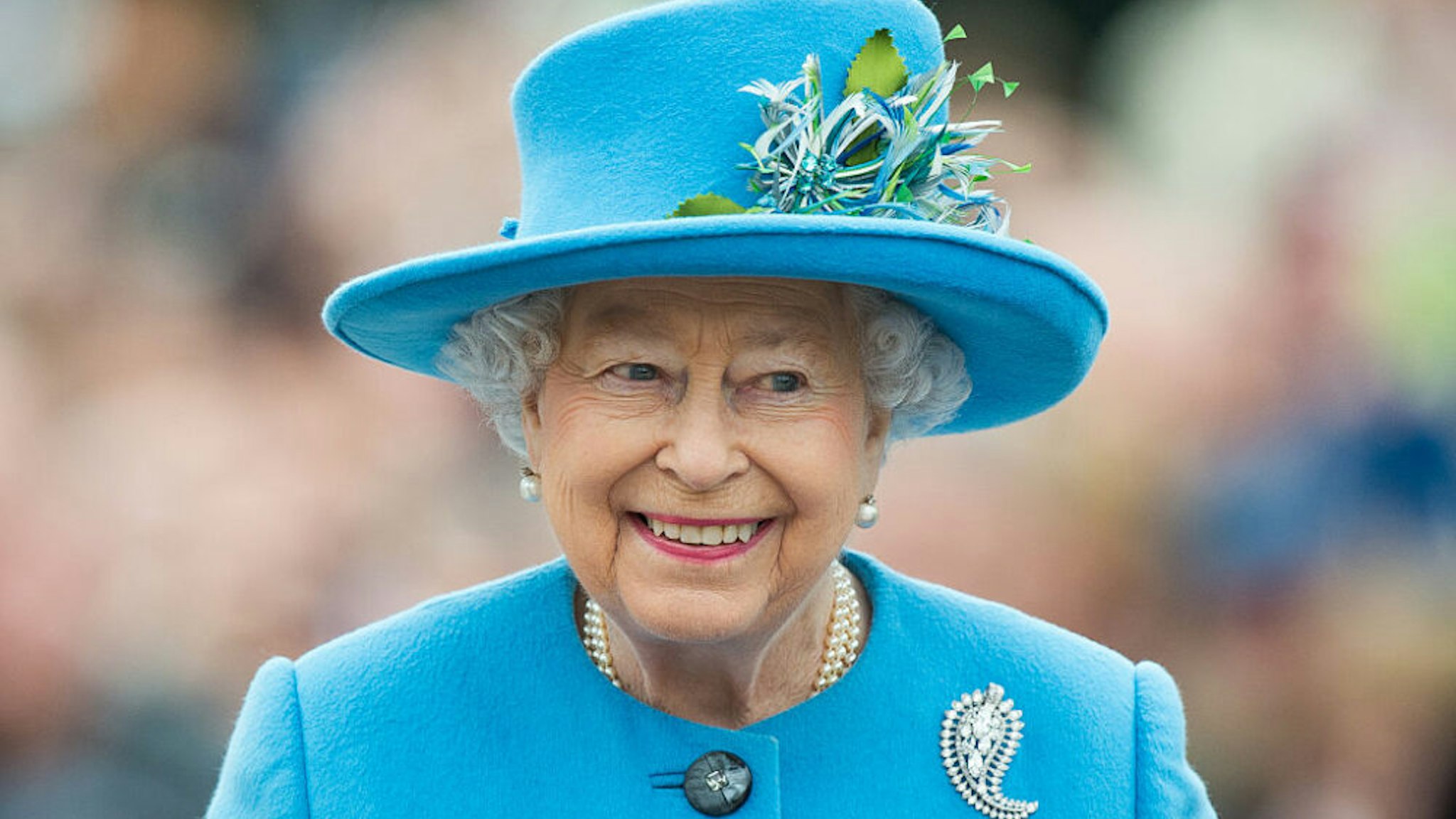 POUNDBURY, DORSET - OCTOBER 27: Queen Elizabeth II tours Queen Mother Square on October 27, 2016 in Poundbury, Dorset.