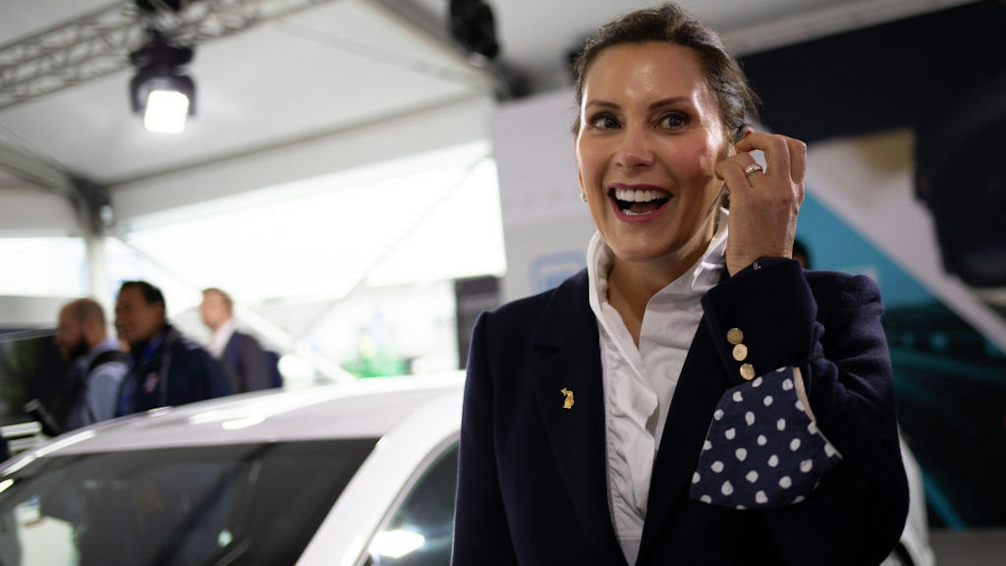 Gretchen Whitmer, governor of Michigan, during a tour of the Motor Bella Auto Show in Pontiac, Michigan, U.S., on Tuesday, Sept. 21, 2021. Motor Bella, a six-day experiential auto show, is making its debut at the M1 Concourse in Pontiac. Photographer: Emily Elconin/Bloomberg