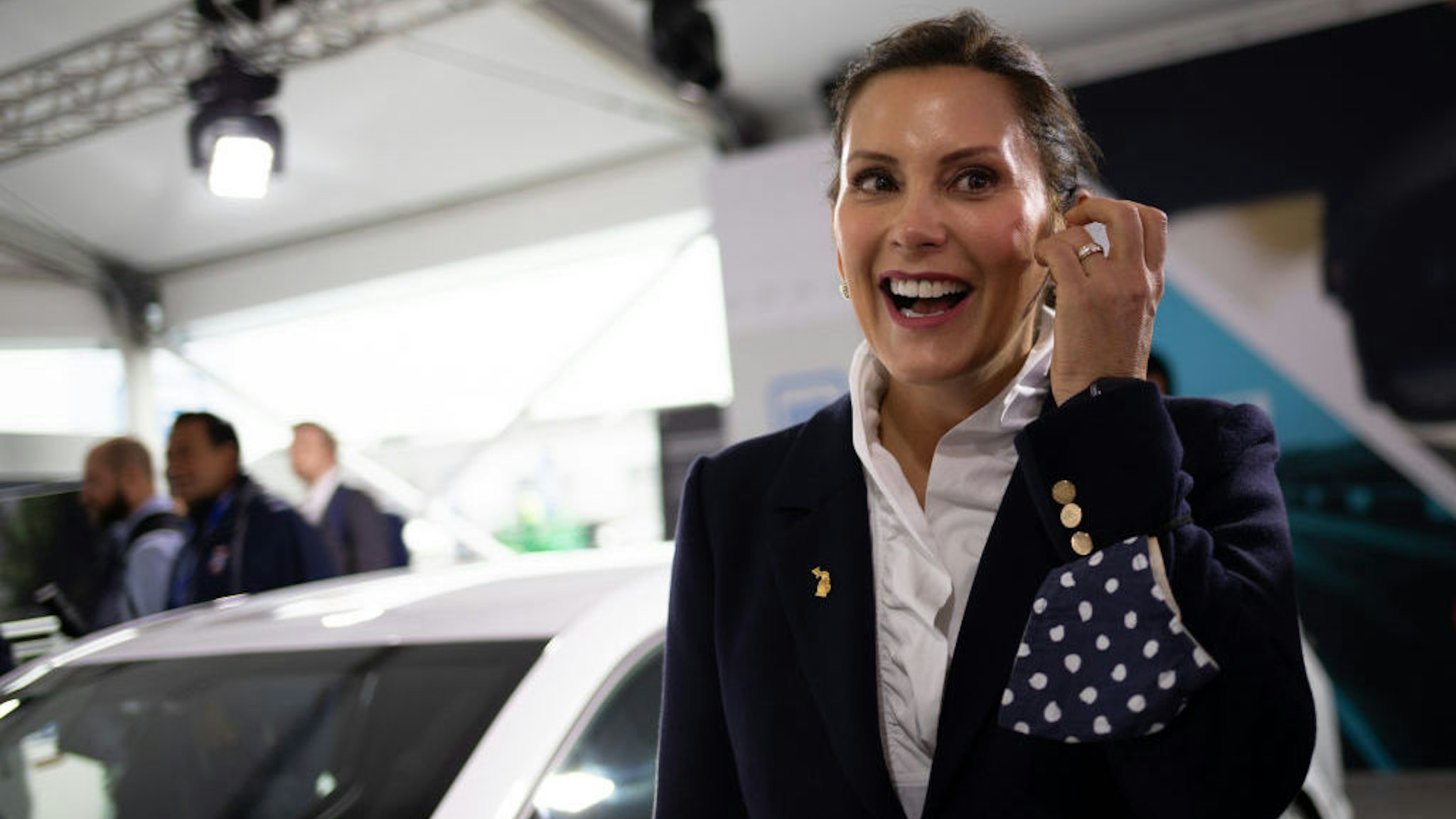 Gretchen Whitmer, governor of Michigan, during a tour of the Motor Bella Auto Show in Pontiac, Michigan, U.S., on Tuesday, Sept. 21, 2021. Motor Bella, a six-day experiential auto show, is making its debut at the M1 Concourse in Pontiac. Photographer: Emily Elconin/Bloomberg