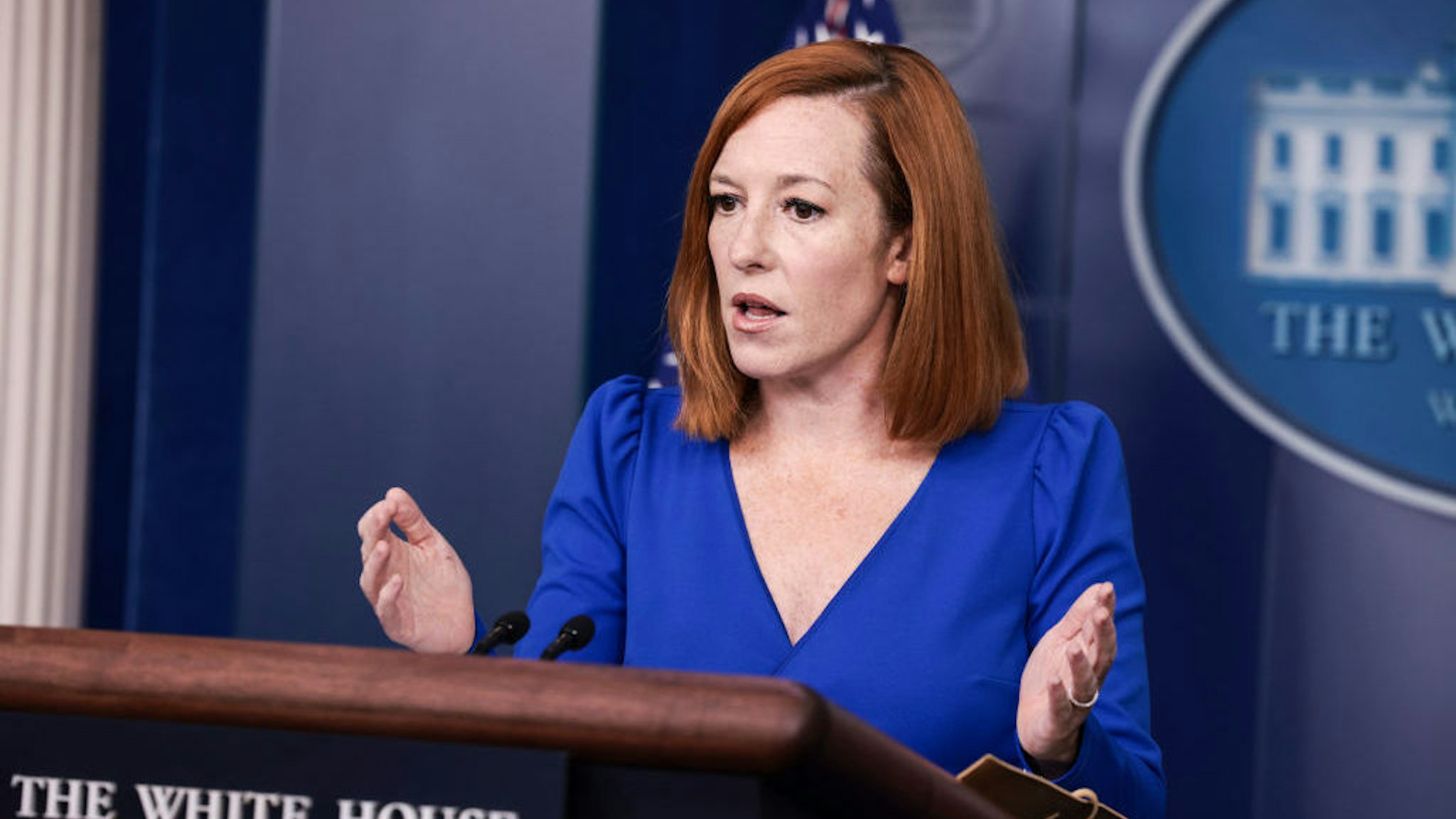 WASHINGTON, DC - OCTOBER 01: White House Press Secretary Jen Psaki gestures as she speaks at a press briefing in the James Brady Press Briefing Room of the White House on October 01, 2021 in Washington, DC. Later today U.S. President Joe Biden will go to Capitol Hill to attend a meeting with the House Democratic Caucus. (Photo by Anna Moneymaker/Getty Images)