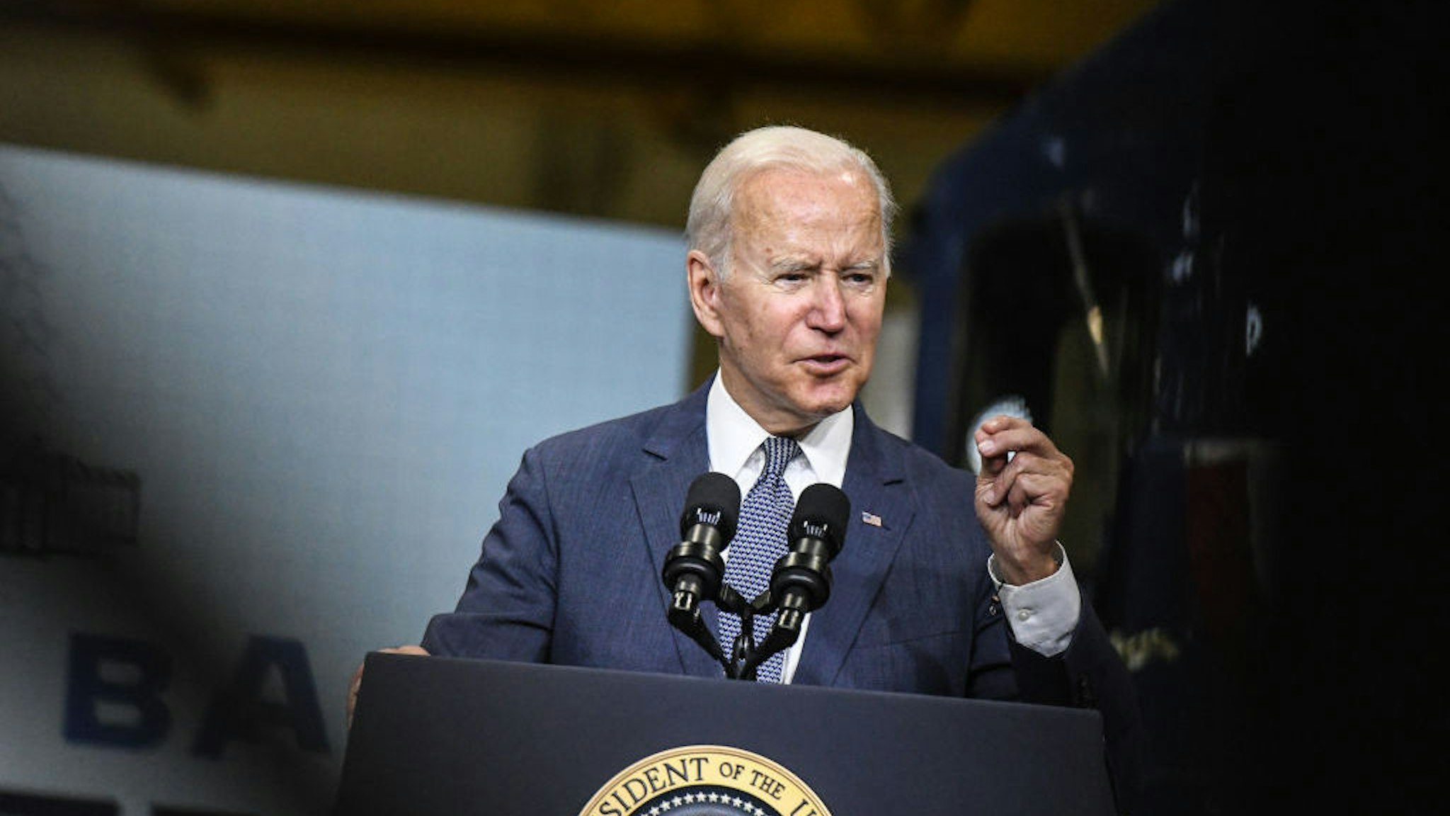 U.S. President Joe Biden speaks at the NJ Transit Meadowlands Maintenance Complex in Kearny, New Jersey, U.S., on Monday, Oct. 25, 2021. Biden will argue that his economic agenda will ease rail congestion in the Northeast Corridor during a trip to the state today that will put him alongside New Jersey Governor Phil Murphy ahead of next week's election. Photographer: Stephanie Keith/Bloomberg