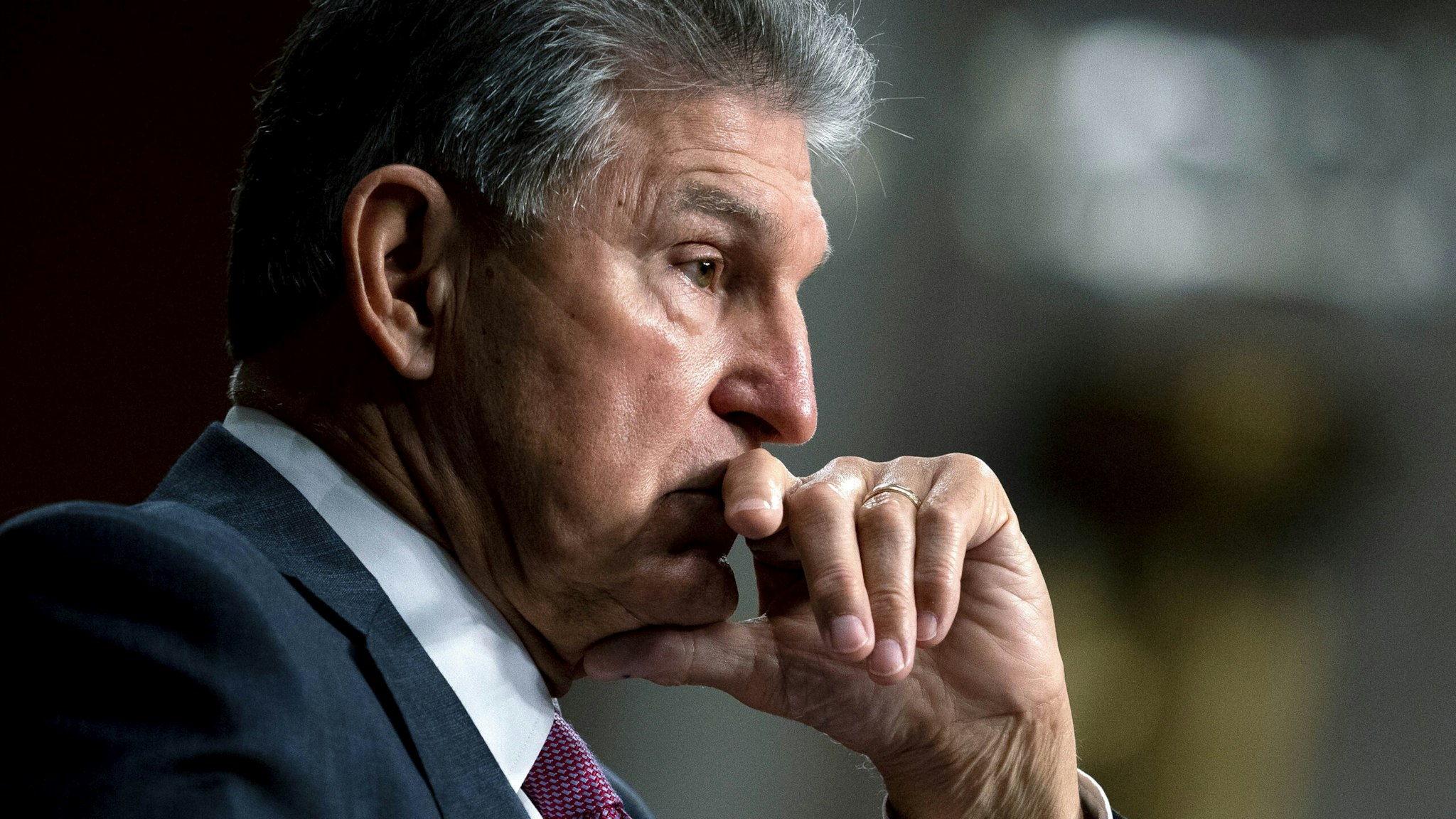 WASHINGTON, DC - SEPTEMBER 28: Sen. Joe Manchin (D-WV) pauses during a Senate Armed Services Committee hearing on the conclusion of military operations in Afghanistan and plans for future counterterrorism operations at the Dirksen Senate Office building on Capitol Hill on September 28, 2021 in Washington, DC.
