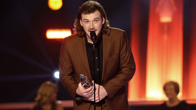 NASHVILLE, TENNESSEE - NOVEMBER 11: (FOR EDITORIAL USE ONLY) Morgan Wallen accepts and award onstage during the The 54th Annual CMA Awards at Nashville’s Music City Center on Wednesday, November 11, 2020 in Nashville, Tennessee. (Photo by Terry Wyatt/Getty Images for CMA)
