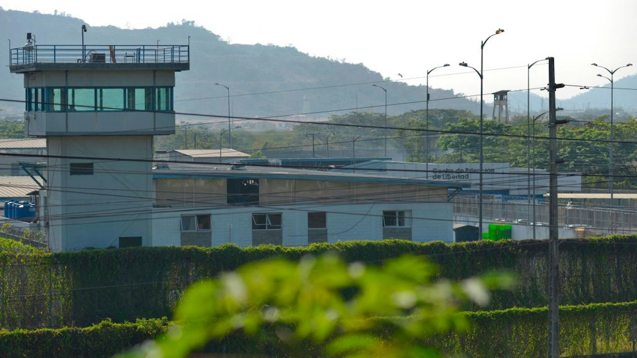 General view of the Guayas 1 prison on the outskirts of Guayaquil, Ecuador, taken on October 1, 2021 a day after police gained control following a riot between inmates which left at least 118 dead. - Police gained control of the Ecuador prison on September 30 where rioting has left at least 118 inmates dead, some of them decapitated, as rival drug gangs went to war armed with guns and grenades. Another 86 inmates were wounded, six of them critically, according to Ecuador's prisons authority, in one of the deadliest prison battles in South American history.