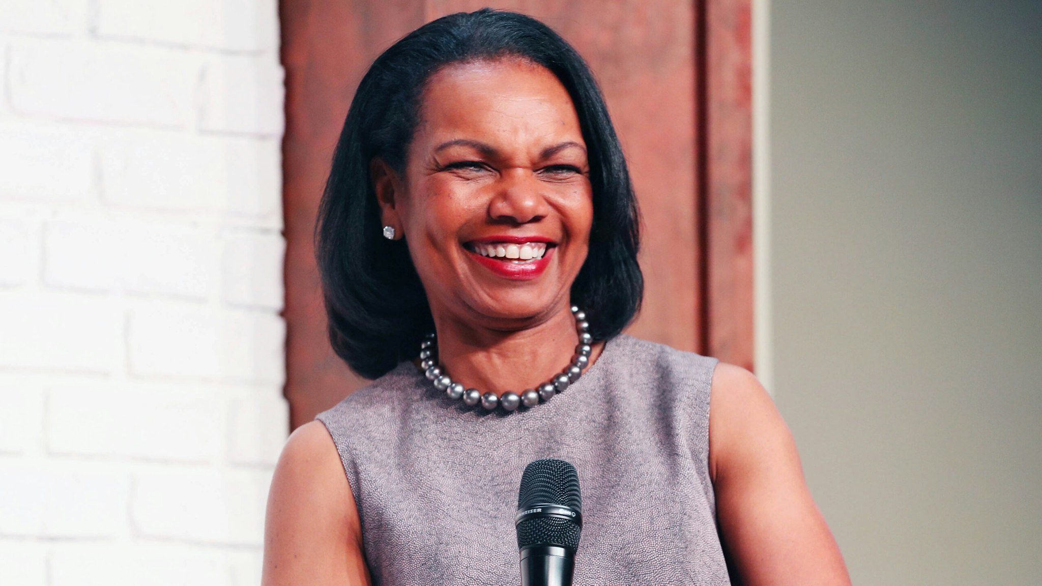OLYMPIA FIELDS, IL - JUNE 28: Dr. Condoleezza Rice chats with guests at the KPMG Women's Leadership Summit prior to the start of the 2017 KPMG Women's PGA Championship at Olympia Fields Country Club on June 28, 2017 in Olympia Fields, Illinois.