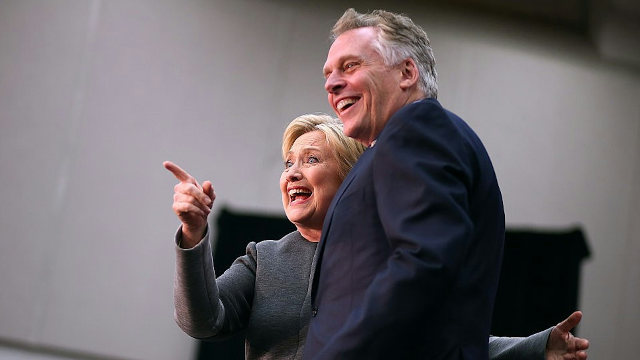 FAIRFAX, VA - FEBRUARY 29: Democratic presidential candidate former Secretary of State Hillary Clinton greets supporters with Virginia Gov. Terry McAuliffe during a "Get Out The Vote" event at George Mason University on February 29, 2016 in Fairfax, Virginia. Hillary Clinton is campaigning in Massachusetts and Virginia ahead of Super Tuesday. (Photo by