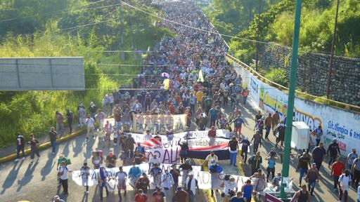 Migrant caravan in Mexico’s Tapachlula TAPACHULA, CHIAPAS, MEXICO - OCTOBER 22: Migrant caravan made up of approximately 3,000 people, called March for Freedom, Dignity and La Paz, managed to break the first police siege of the National Institute of Migration, National Guard and State Police that he was on the outskirts of Tapachula, Chiapas in Mexico on October 22, 2021. They continue on their way to Mexico City.