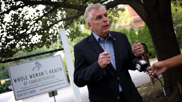 Former Virginia Gov. Terry McAuliffe, Democratic gubernatorial candidate for Virginia for a second term, answers questions from members of the press after touring Whole Women's Health of Charlottesville September 9, 2021 in Charlottesville, Virginia.