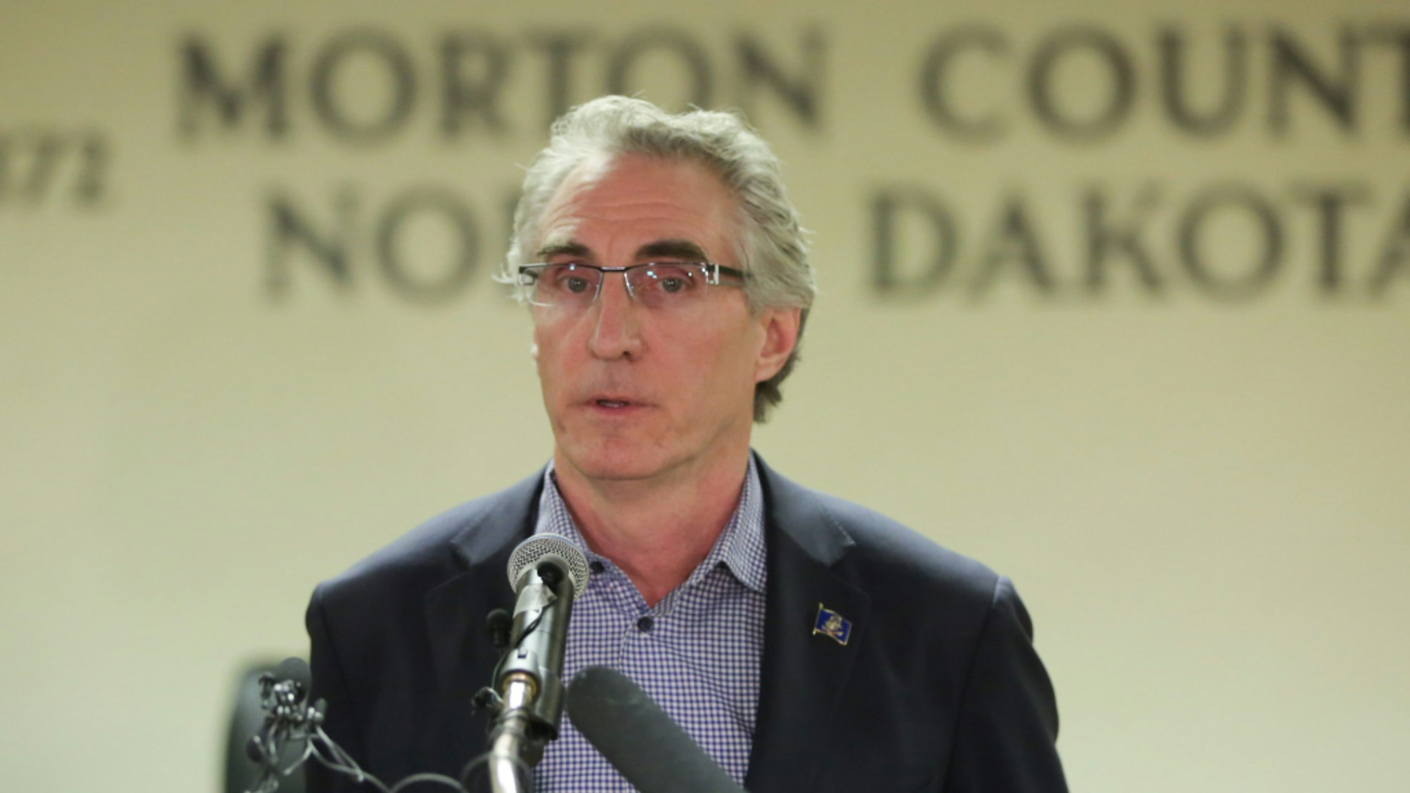 North Dakota Governor Doug Burgum speaks during a press conference announcing plans for the clean up of the Oceti Sakowin protest camp on February 22, 2017 in Mandan, North Dakota.
