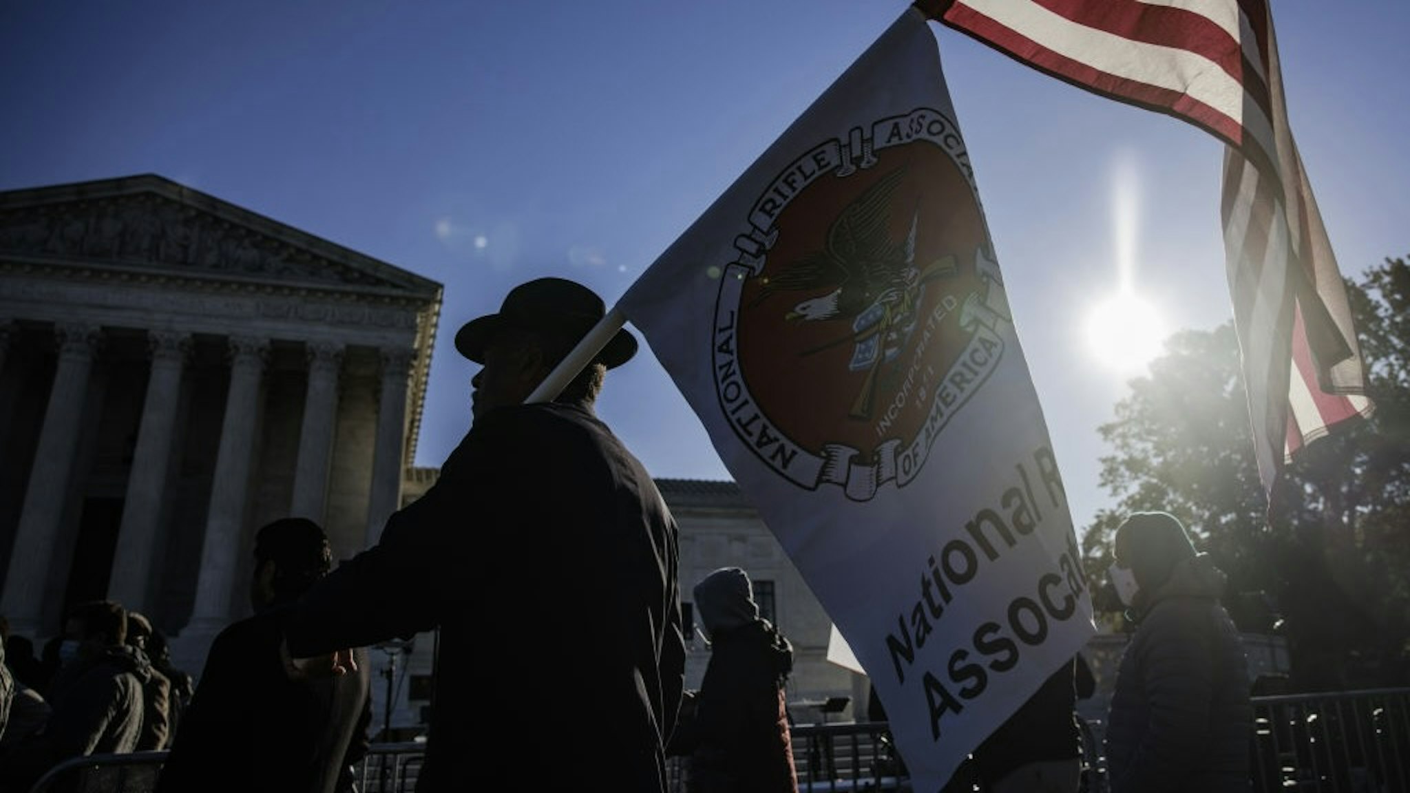 Supreme Courts Hears Arguments In Second Amendment Case A Second Amendment demonstrator holds American and National Rifle Association (NRA) flags outside the U.S. Supreme Court in Washington, D.C., U.S., on Wednesday, Nov. 3, 2021. The court is hearing its biggest Second Amendment case in more than a decade today when it considers a challenge to New York's tight limits on the right to carry a concealed handgun in public. Photographer: Samuel Corum/Bloomberg via Getty Images Bloomberg / Contributor