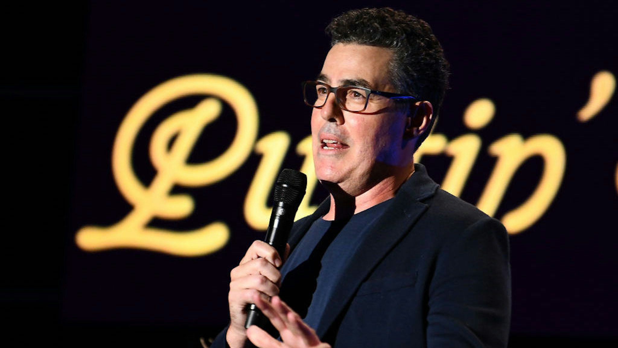 BEVERLY HILLS, CALIFORNIA - OCTOBER 17: Adam Carolla performs onstage at the International Myeloma Foundation 13th Annual Comedy Celebration at The Beverly Hilton Hotel on October 17, 2019 in Beverly Hills, California. (Photo by Araya Diaz/Getty Images for International Myeloma Foundation)