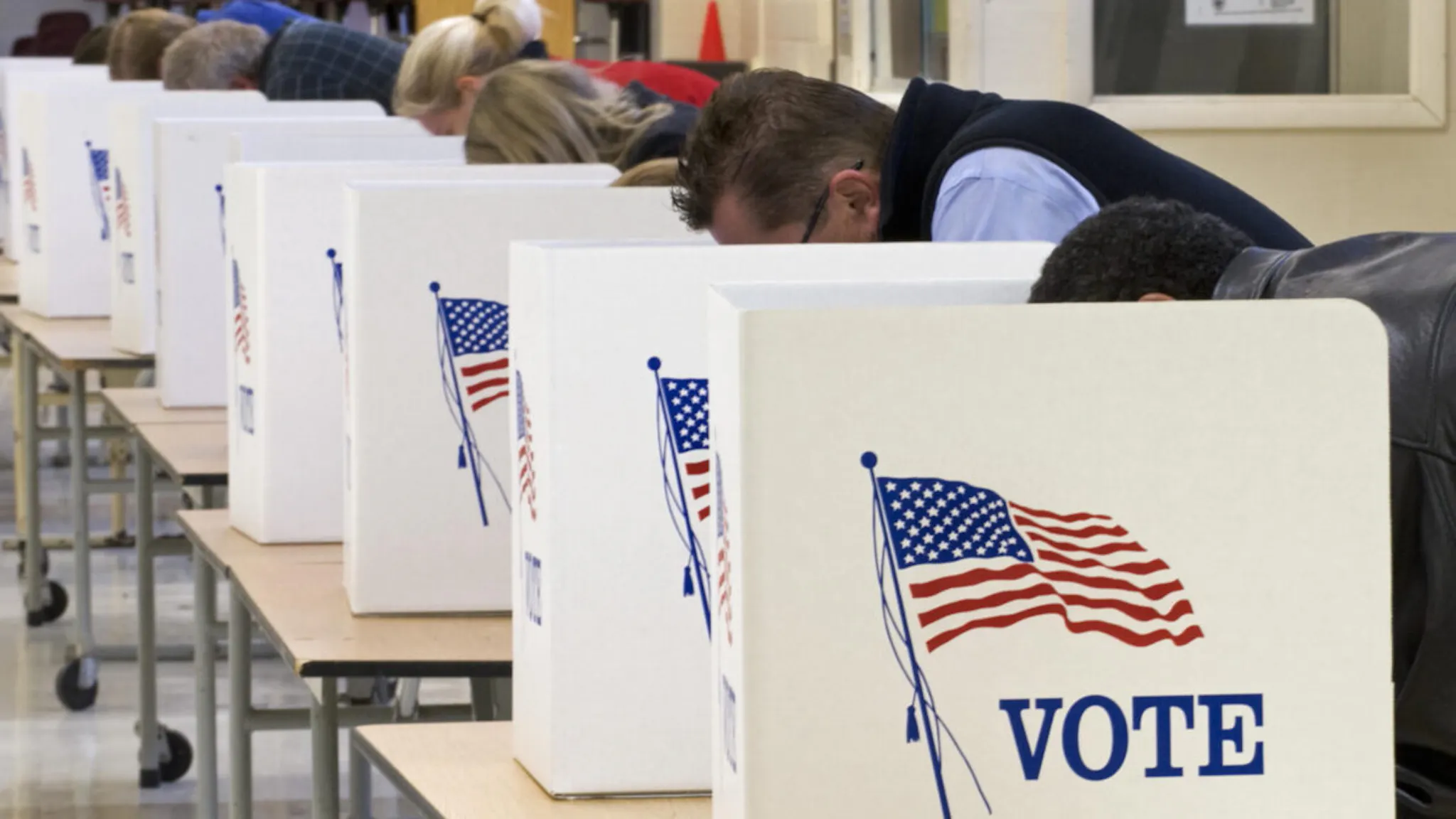 Voting Voters cast their ballots on Election Day November 04, 2008, at Centreville High School in Clifton, Virginia.