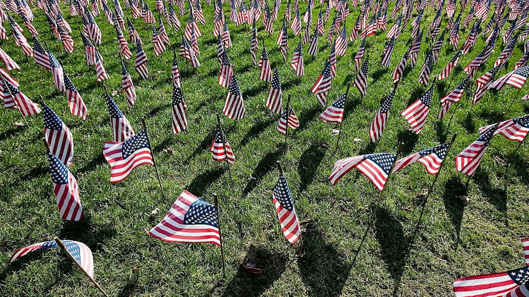 YORK, PA - NOVEMBER 11: Flags line the Iraq War Flag Memorial at the Prospect Hill Cemetery November 11, 2006 in York, Pennsylvania. More than 180 flags were added to the hillside display of 2,669 flags that honor soldiers killed in the war in Iraq.