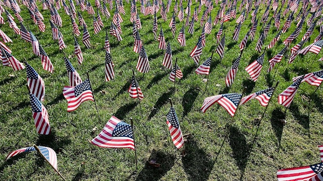 YORK, PA - NOVEMBER 11: Flags line the Iraq War Flag Memorial at the Prospect Hill Cemetery November 11, 2006 in York, Pennsylvania. More than 180 flags were added to the hillside display of 2,669 flags that honor soldiers killed in the war in Iraq.