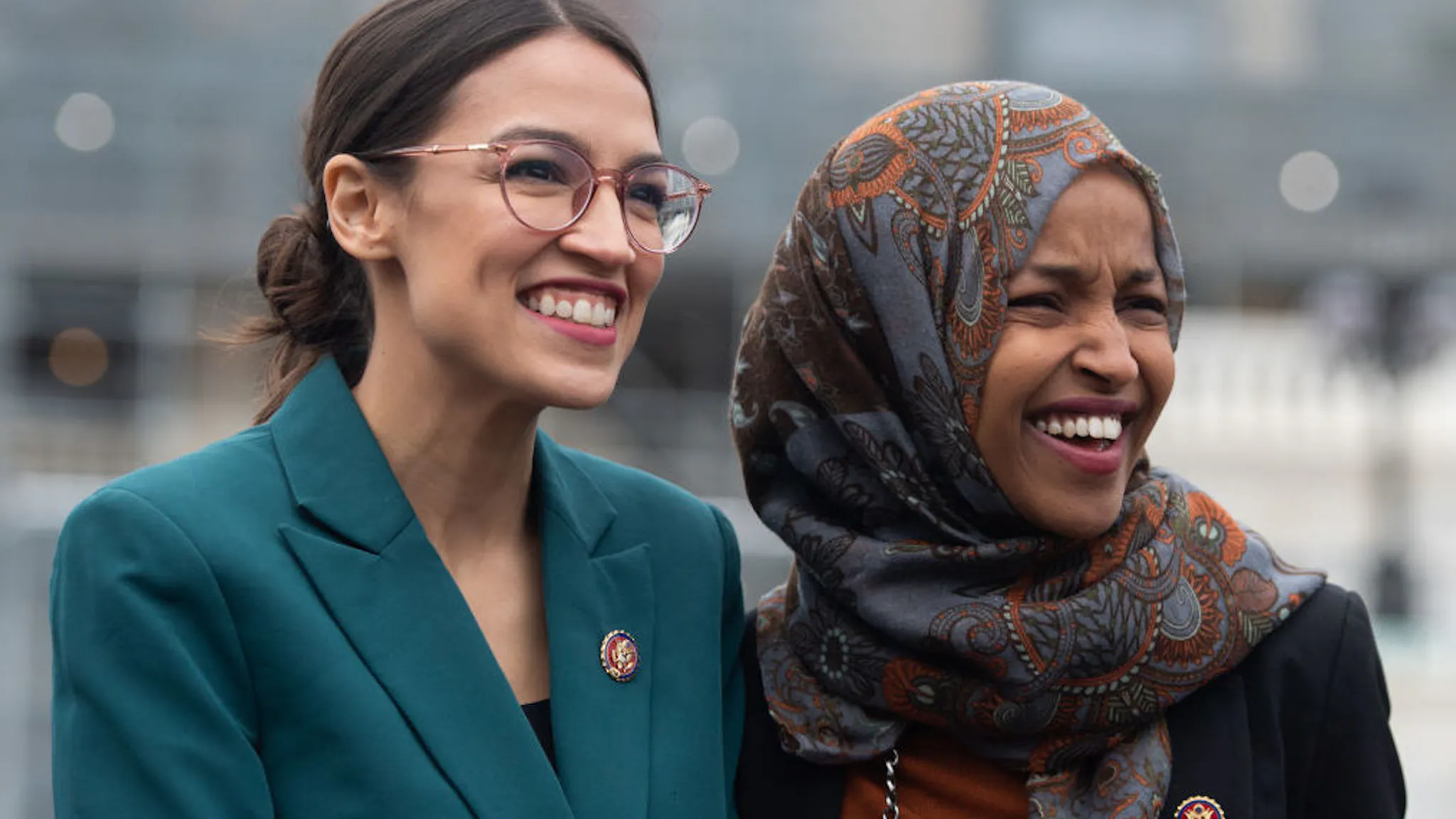 US-POLITICS-IMMIGRATION US Representative Alexandria Ocasio-Cortez, Democrat of New York, and US Representative Ilhan Omar (R), Democrat of Minnesota, attend a press conference calling on Congress to cut funding for US Immigration and Customs Enforcement (ICE) and to defund border detention facilities, outside the US Capitol in Washington, DC, February 7, 2019.