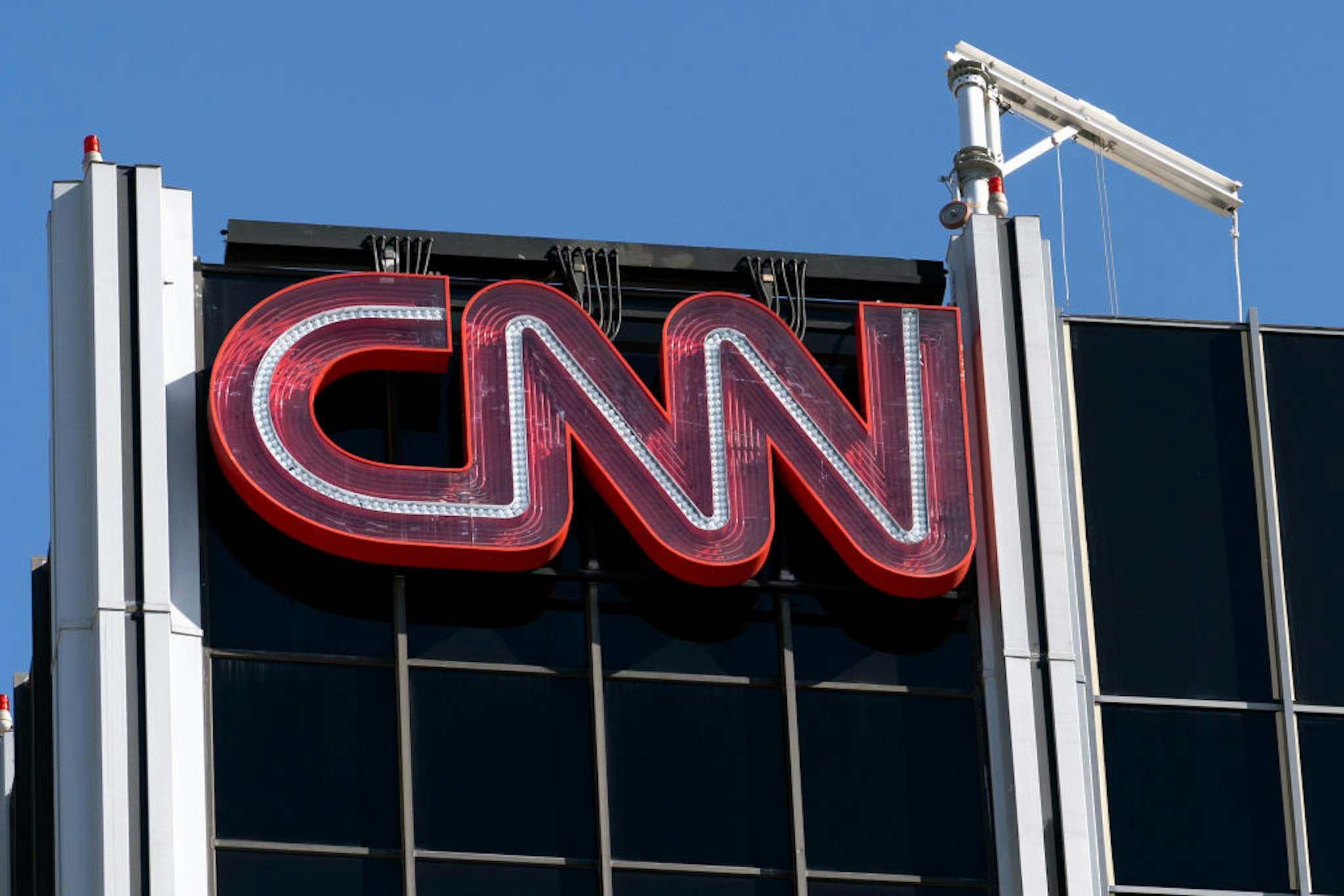 The CNN logo is seen atop its bureau in Los Angeles, California.