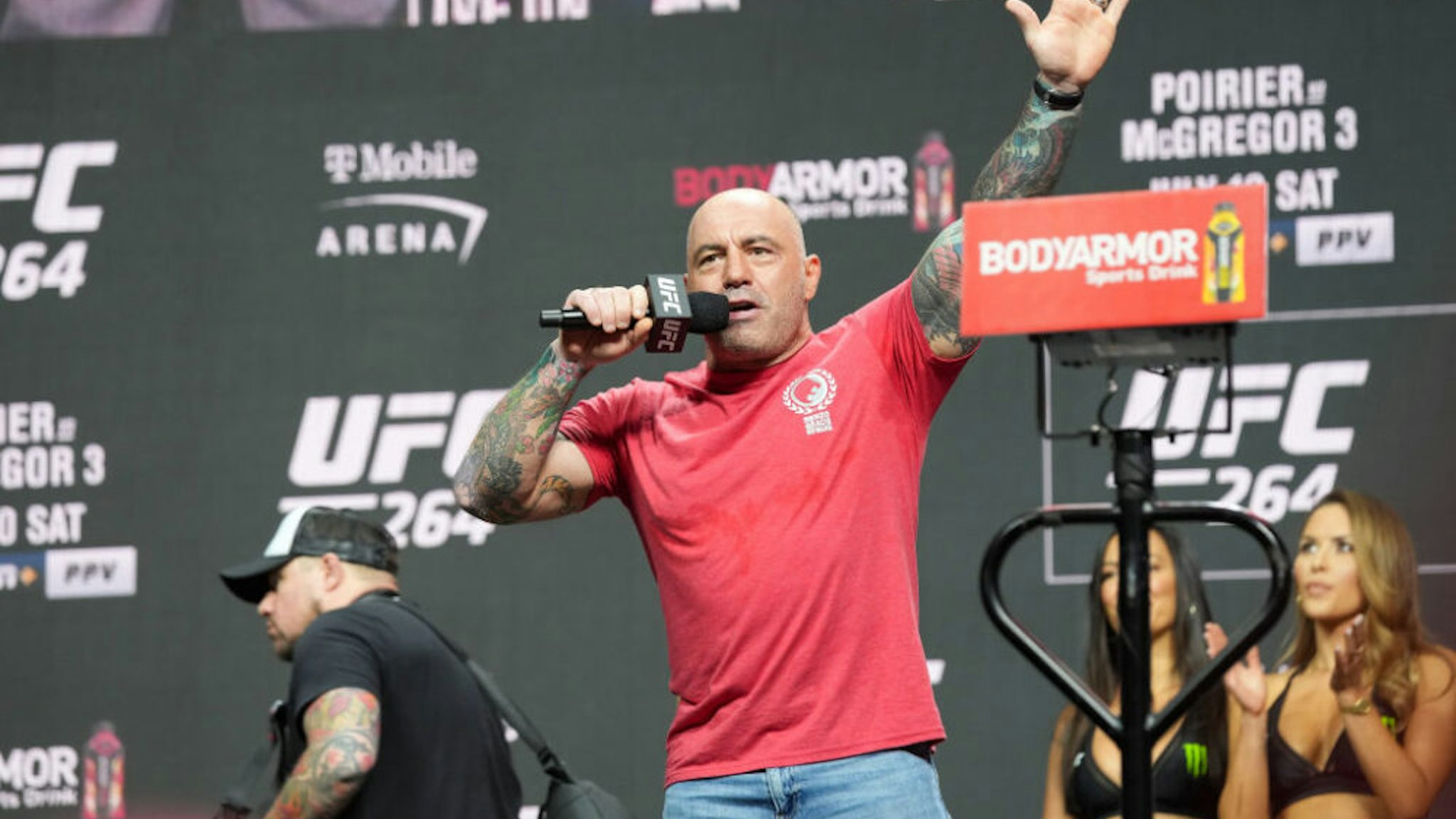 LAS VEGAS, NV - JULY 09: Joe Rogan waves to a packed house at the UFC 264 ceremonial weigh-in at T-Mobile Arena on July 9, 2021 in Las Vegas, NV, United States.