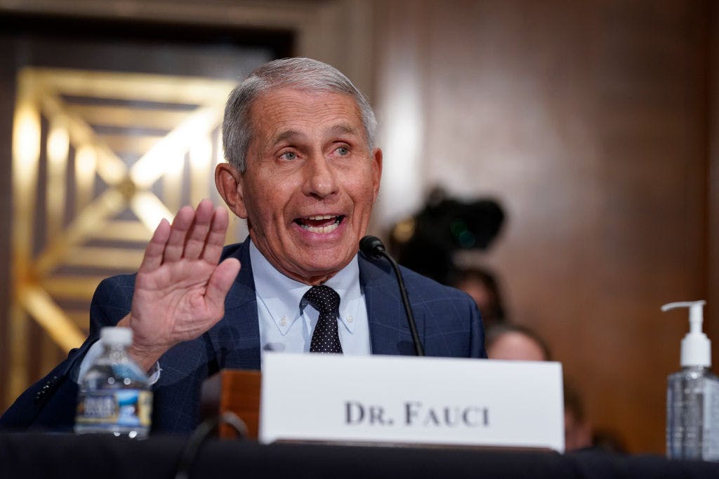 WASHINGTON, DC - JULY 20: Top infectious disease expert Dr. Anthony Fauci responds to accusations by Sen. Rand Paul, R-Ky., as he testifies before the Senate Health, Education, Labor, and Pensions Committee, July 20, 2021 on Capitol Hill in Washington, DC. Cases of COVID-19 have tripled over the past three weeks, and hospitalizations and deaths are rising among unvaccinated people. (Photo by J. Scott Applewhite-Pool/Getty Images)