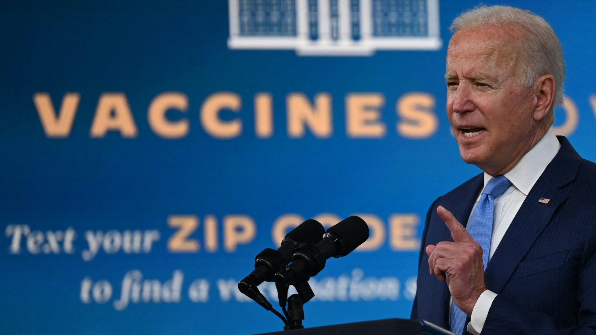 US President Joe Biden delivers remarks on the Covid-19 response and the vaccination program at the White House on August 23, 2021 in Washington,DC. - The US Food and Drug Administration on Monday fully approved the Pfizer-BioNTech Covid vaccine, a move that triggered a new wave of vaccine mandates as the Delta variant batters the country.Around 52 percent of the American population is fully vaccinated, but health authorities have hit a wall of vaccine hesitant people, impeding the national campaign. (Photo by Jim WATSON / AFP) (Photo by JIM WATSON/AFP via Getty Images)