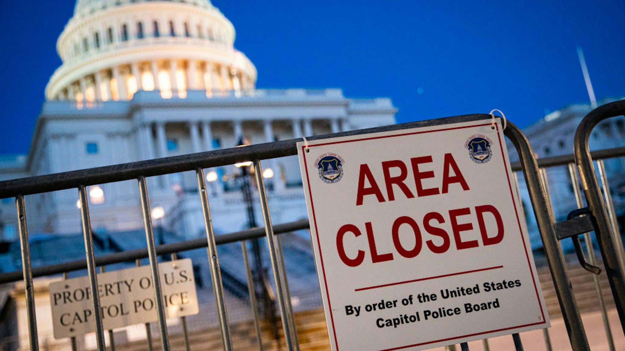 A sign denotes a portion of the West Front of the U.S. Capitol remains closed, as security fencing is removed on September 19, 2021 in Washington, DC.