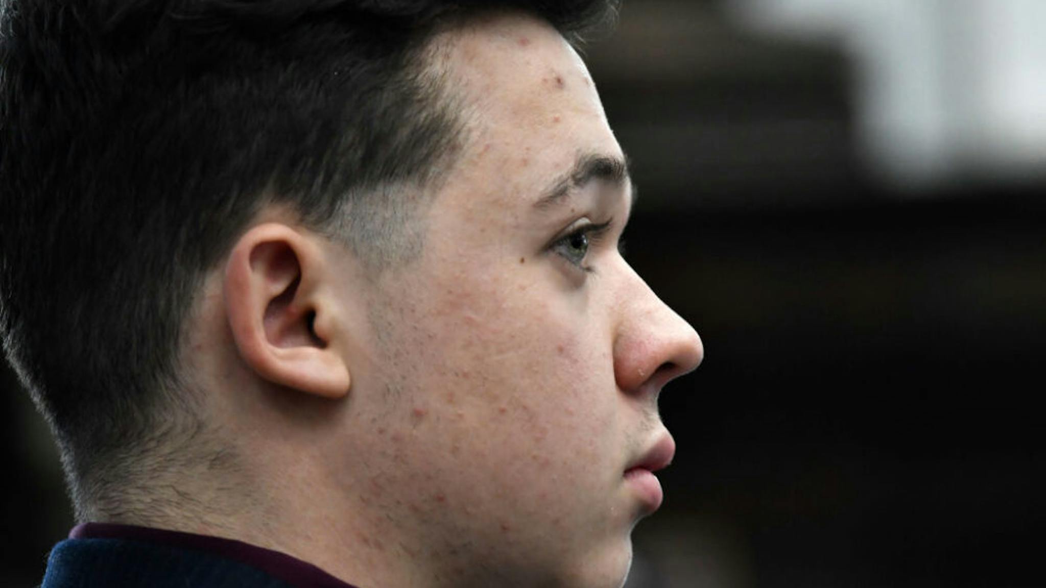 Kyle Rittenhouse KENOSHA, WISCONSIN - NOVEMBER 02: Kyle Rittenhouse listens as Assistant District Attorney Thomas Binger gives an opening statement to the jury during his trial at the Kenosha County Courthouse on November 2, 2021 in Kenosha, Wisconsin. Rittenhouse shot three demonstrators, killing two of them, during a night of unrest that erupted in Kenosha after a police officer shot Jacob Blake seven times in the back while police attempted to arrest him in August 2020. Rittenhouse, from Antioch, Illinois, was 17 at the time of the shooting and armed with an assault rifle. He faces counts of felony homicide and felony attempted homicide.