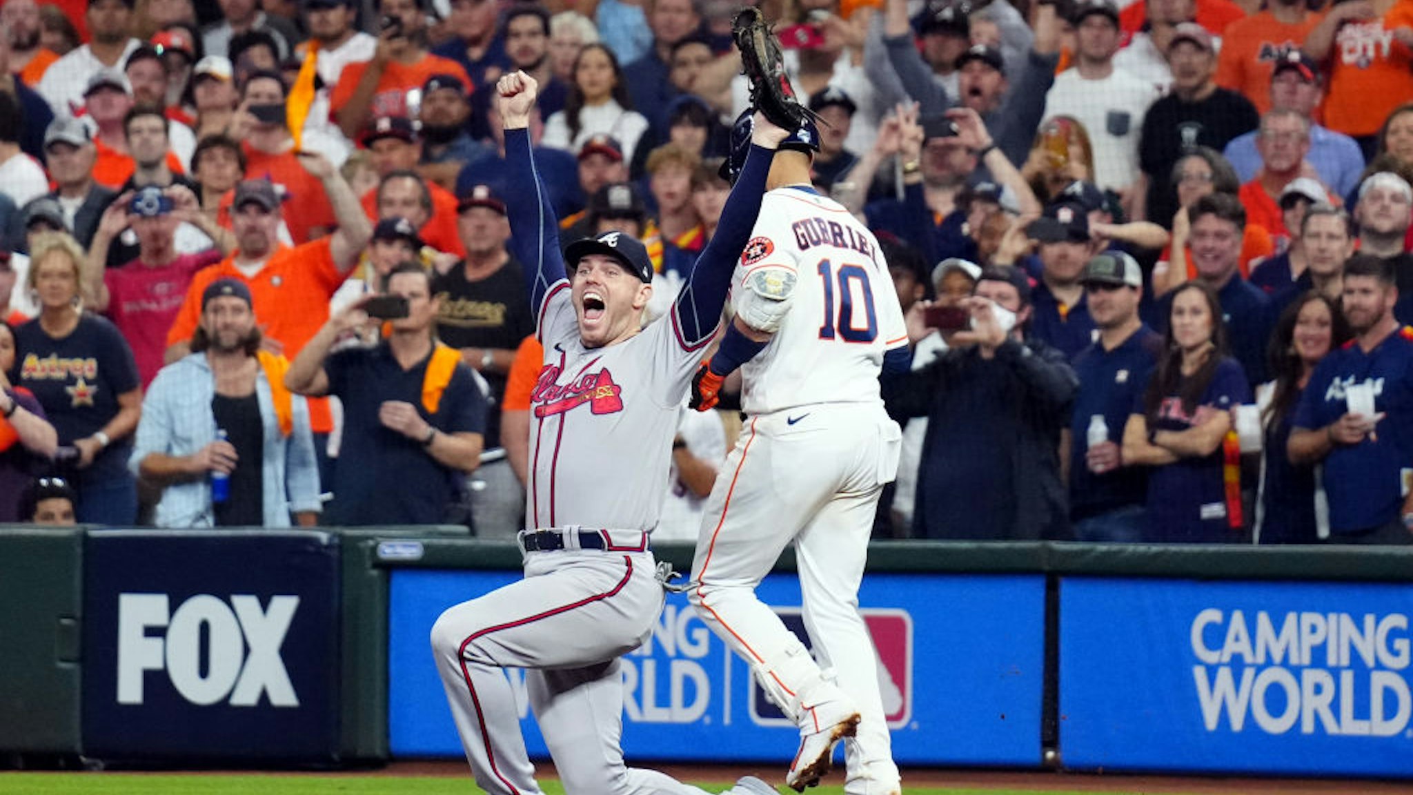 HOUSTON, TX - NOVEMBER 02: Freddie Freeman #5 of the Atlanta Braves celebrates after catching the final out to defeat the Houston Game 6 to clinch the 2021 World Series at Minute Maid Park on Tuesday, November 2, 2021 in Houston, Texas. (Photo by Daniel Shirey/MLB Photos via Getty Images)